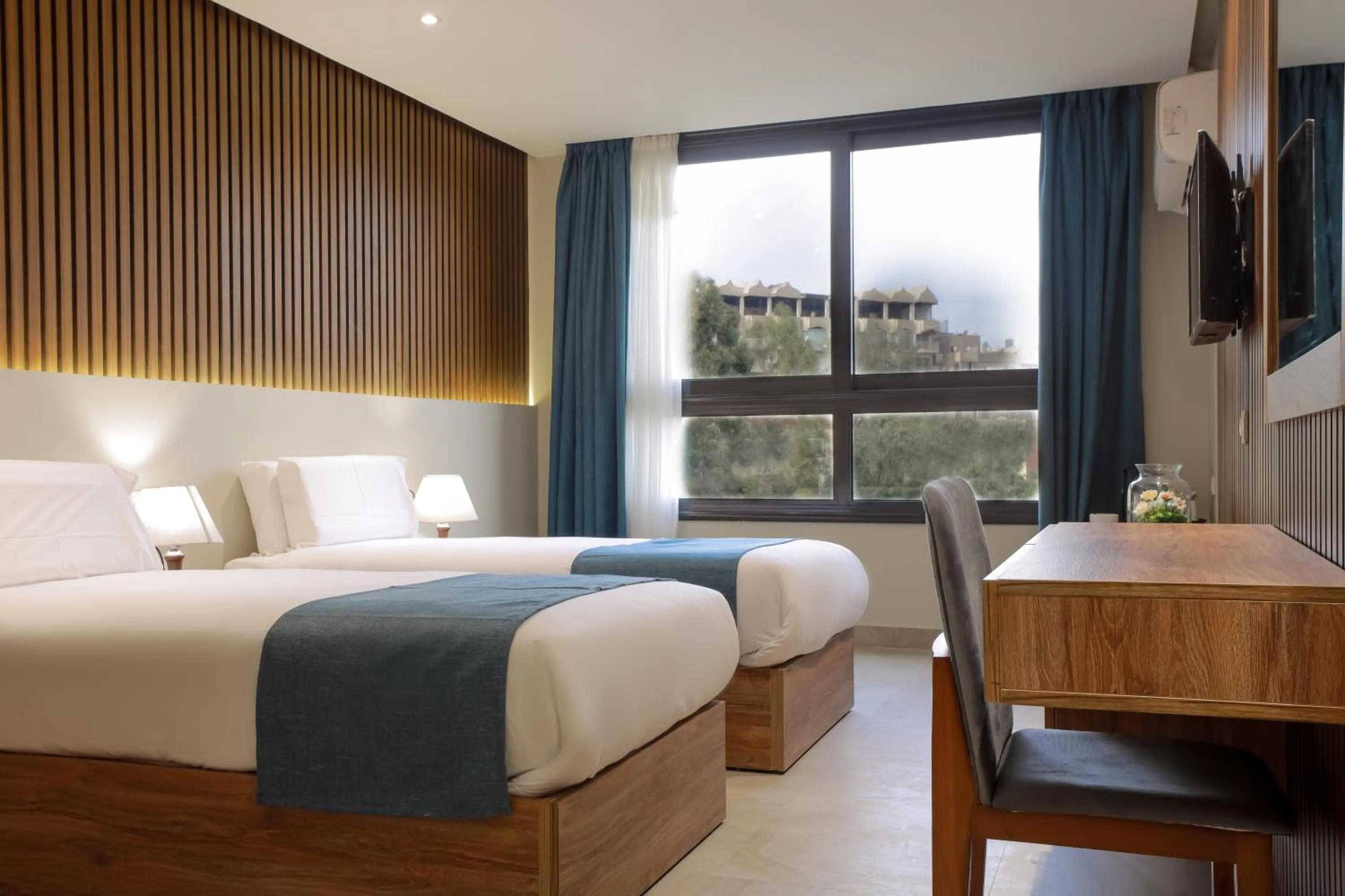 Bed in Pyramid Front Hotel