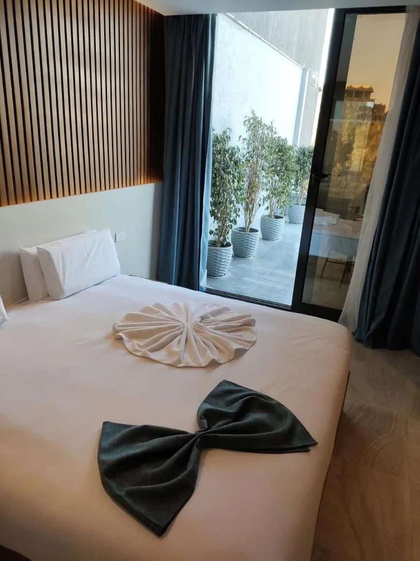 Bed in Pyramid Front Hotel