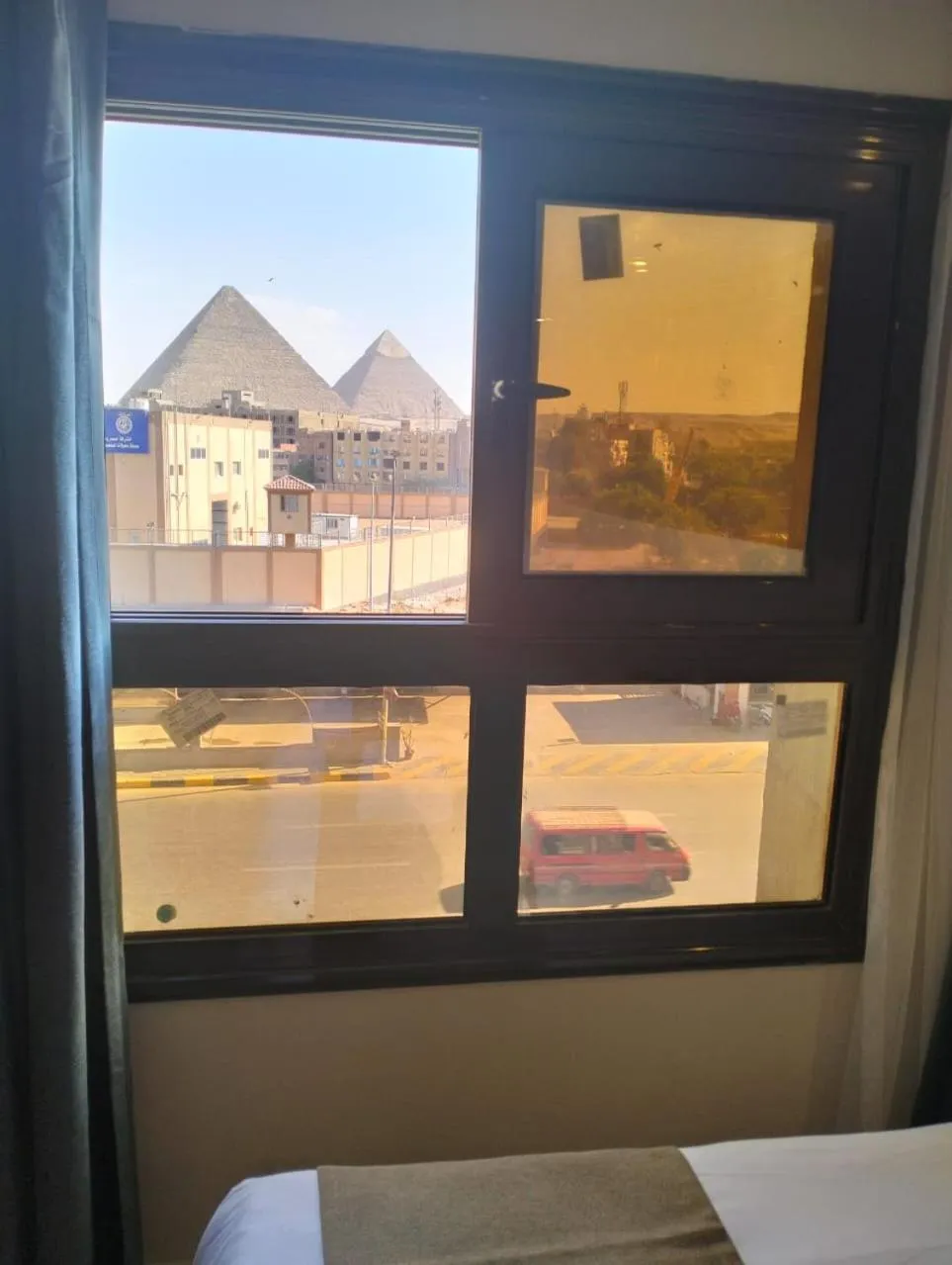 View (from property/room), Bed in Pyramid Front Hotel