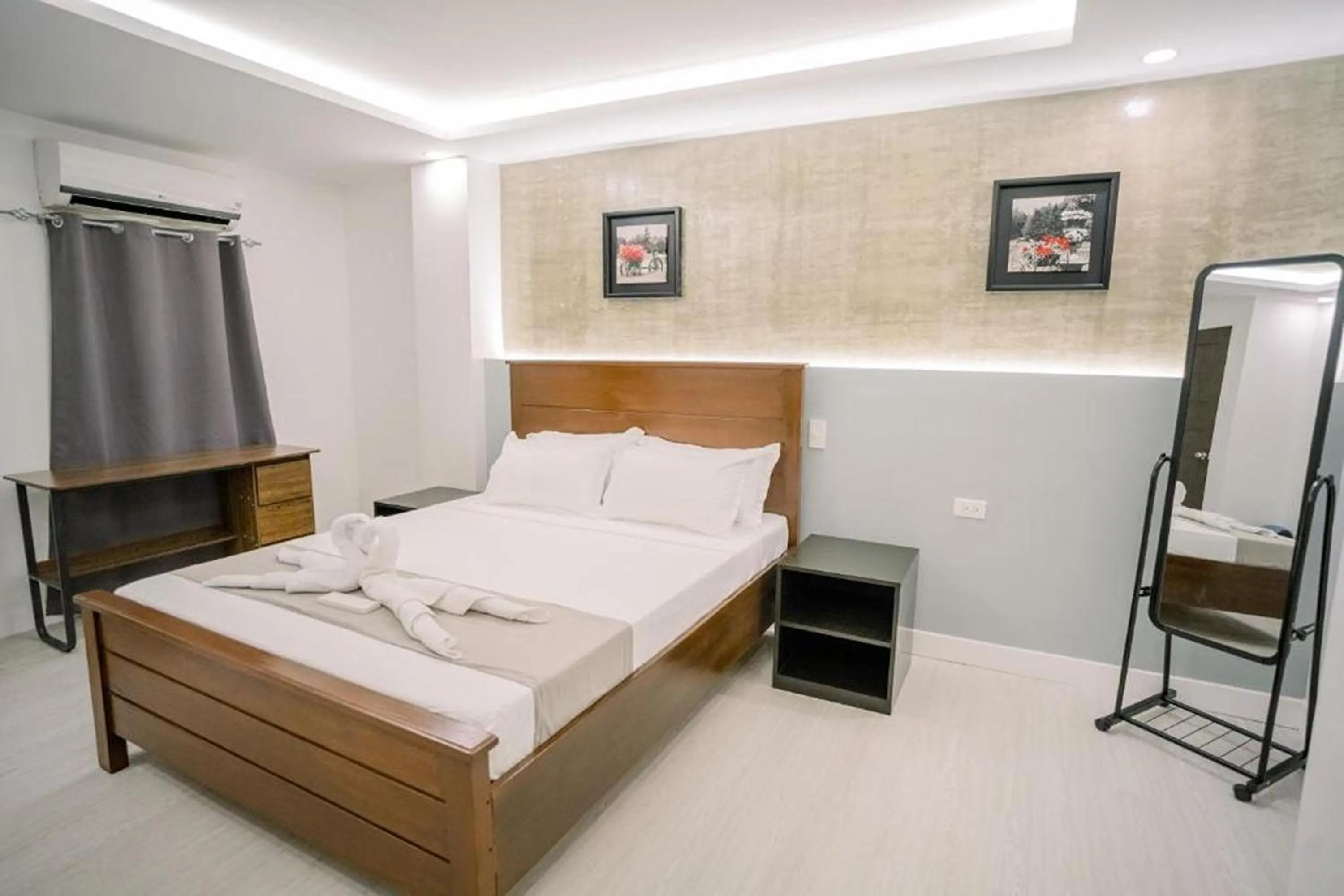 Bedroom in Spotlight Hotel near Hundred Islands Wharf