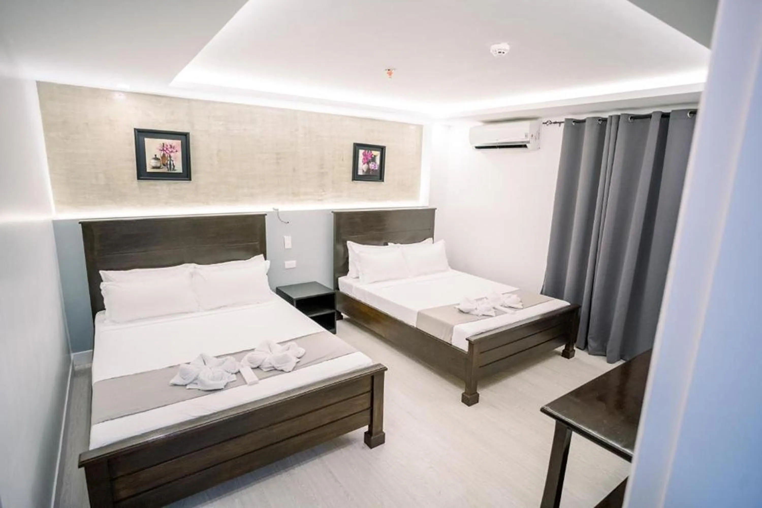 Bedroom in Spotlight Hotel near Hundred Islands Wharf