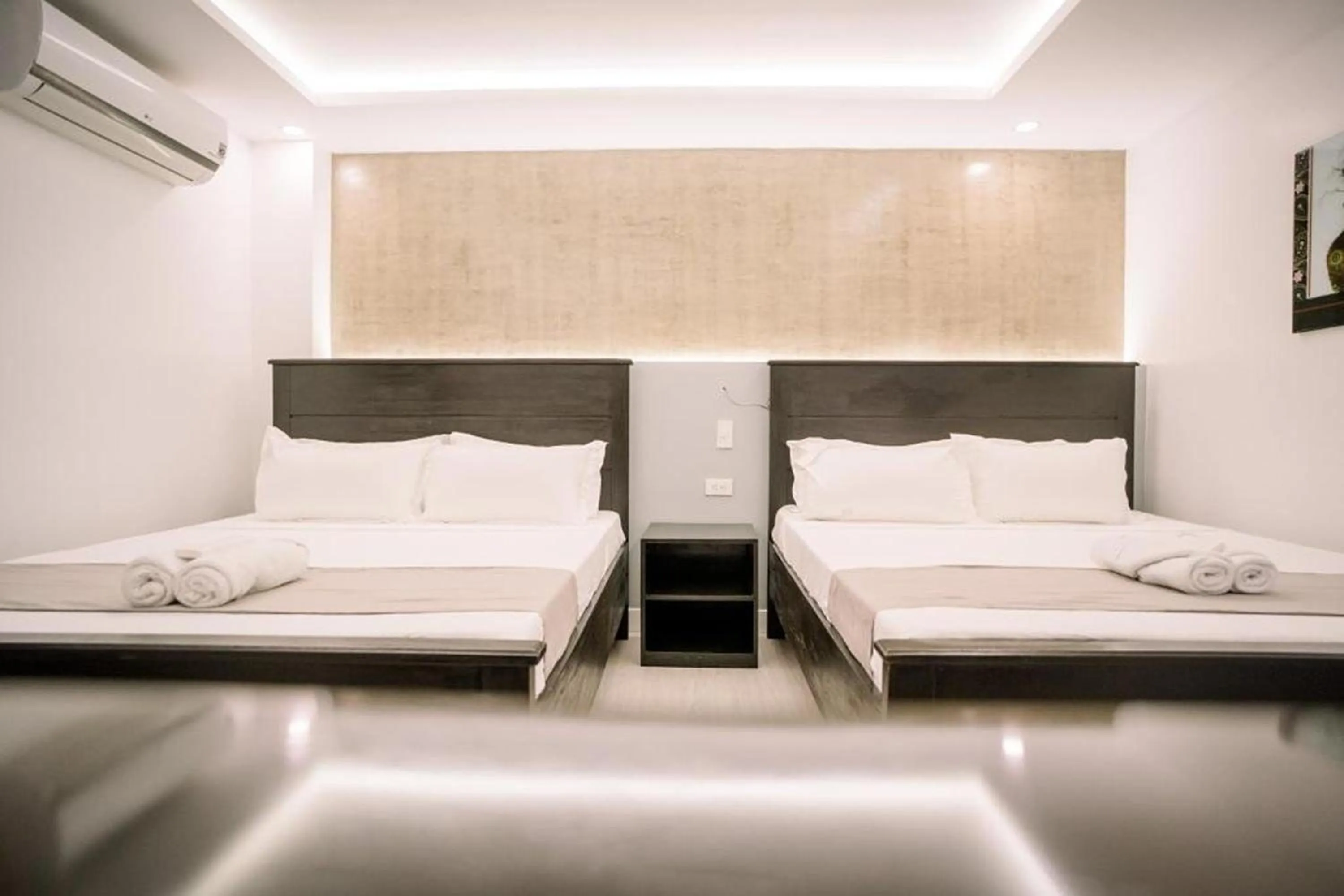 Bedroom in Spotlight Hotel near Hundred Islands Wharf