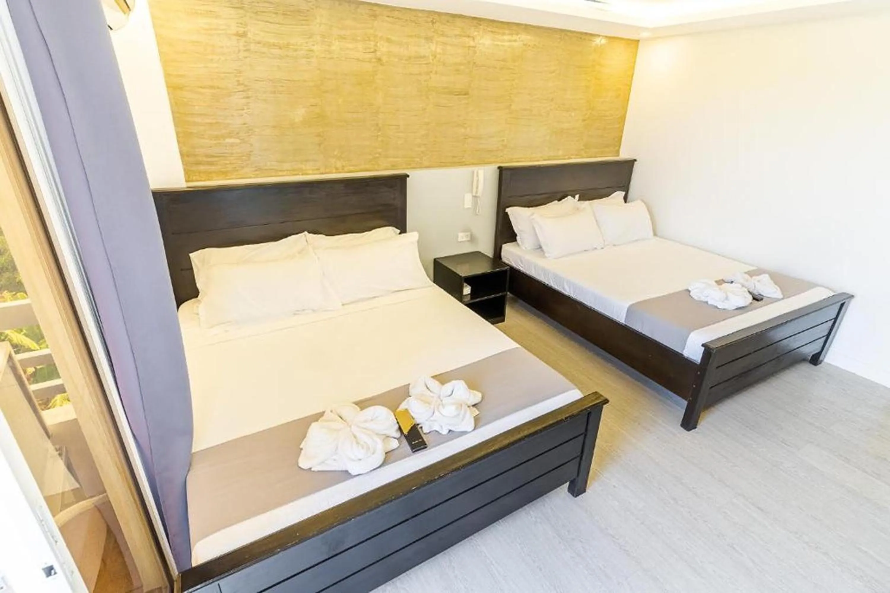 Bedroom in Spotlight Hotel near Hundred Islands Wharf