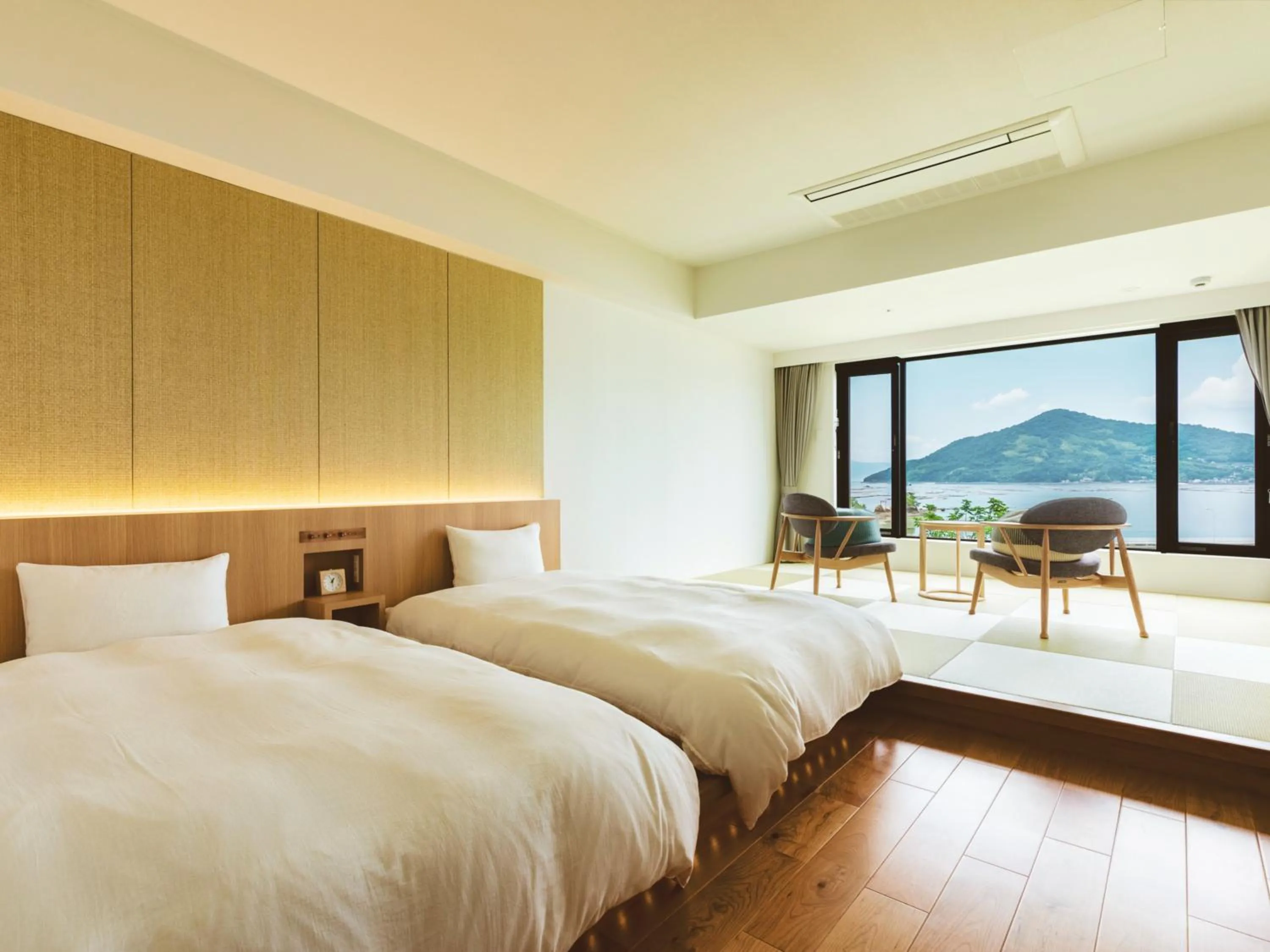 Photo of the whole room, Bed in Etajimasou Hotel & SPA Hiroshima