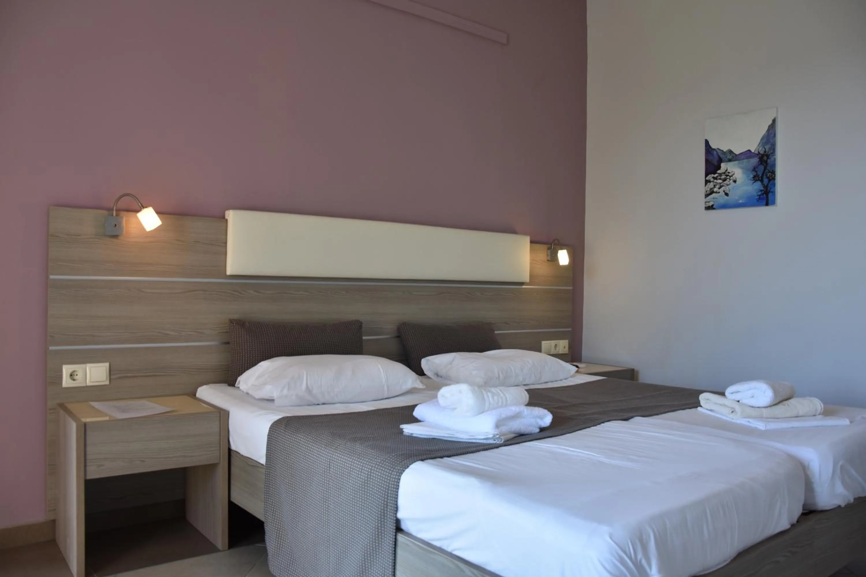 Bed in Thalassa House Apartments