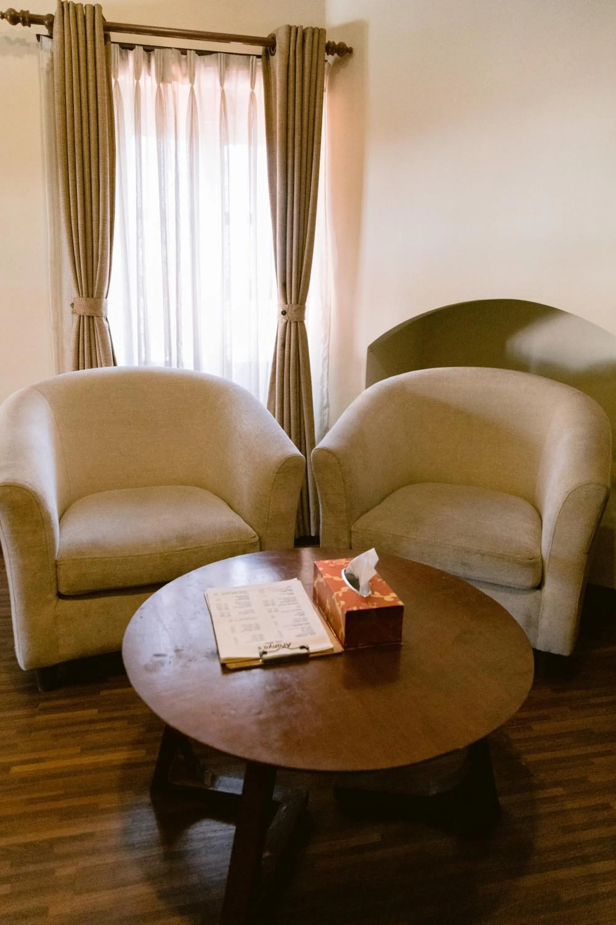 Seating area in Aranya Boutique Hotel