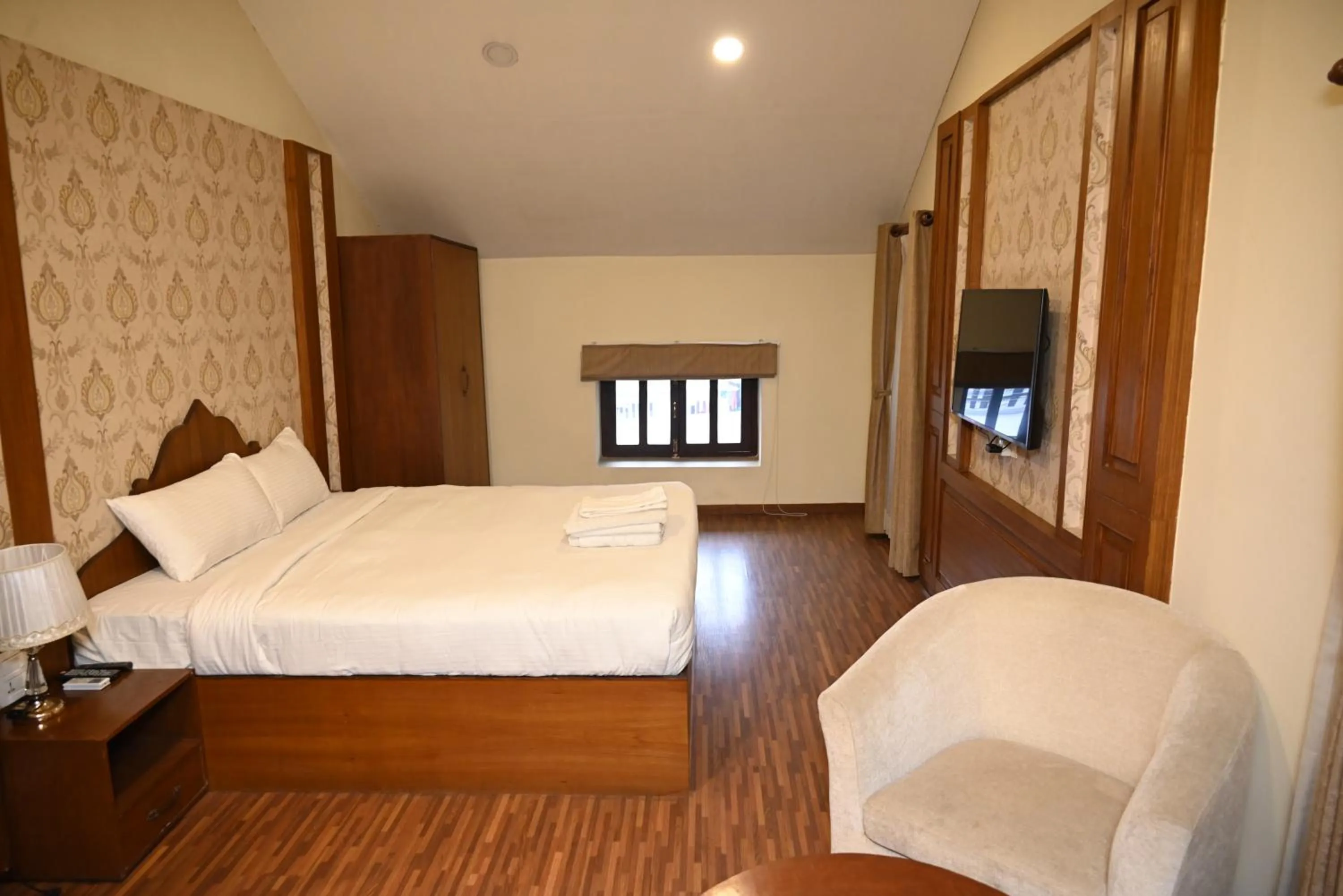 Bed in Aranya Boutique Hotel