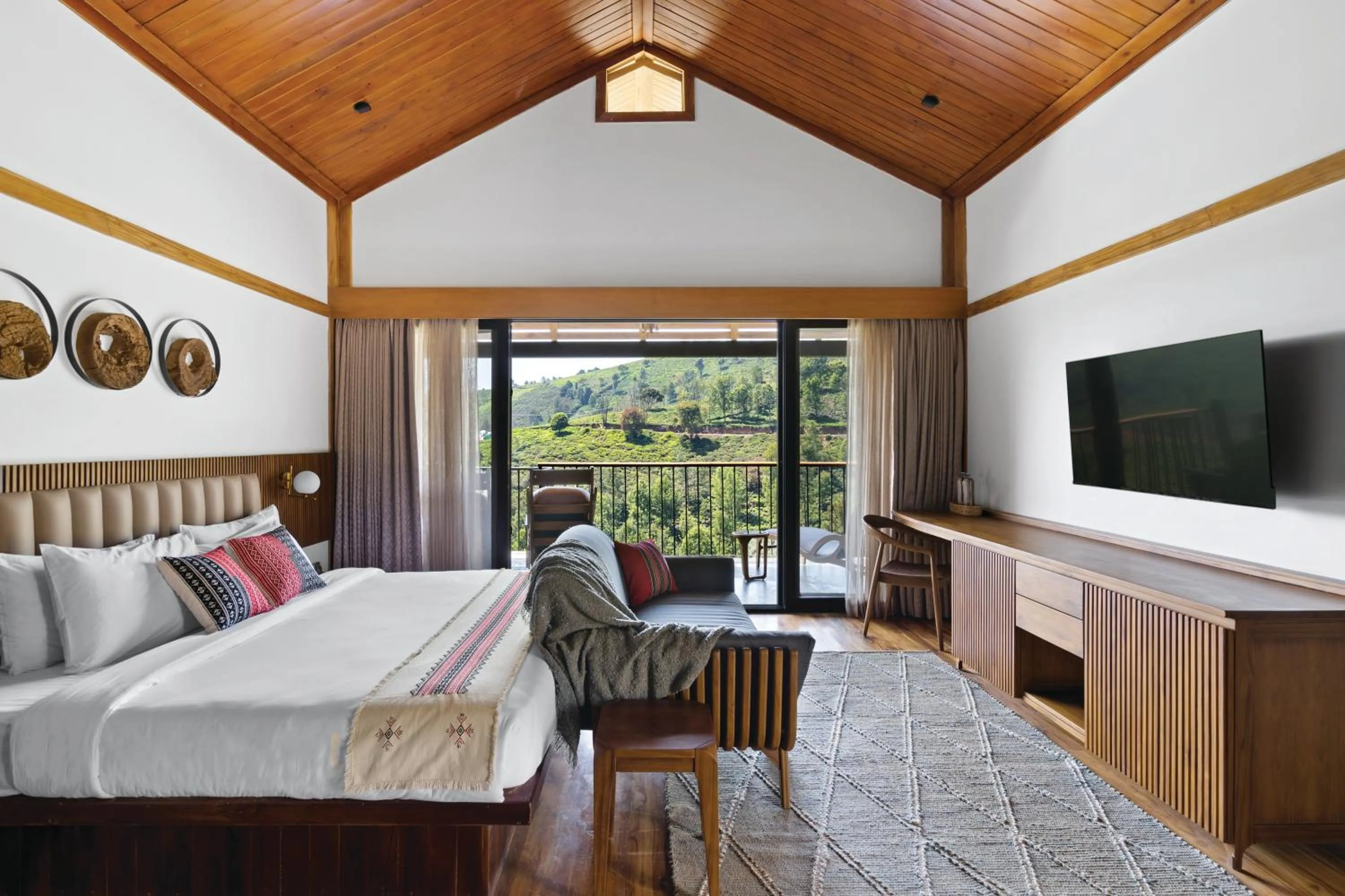 Bed in WelcomHeritage Ayatana Ooty