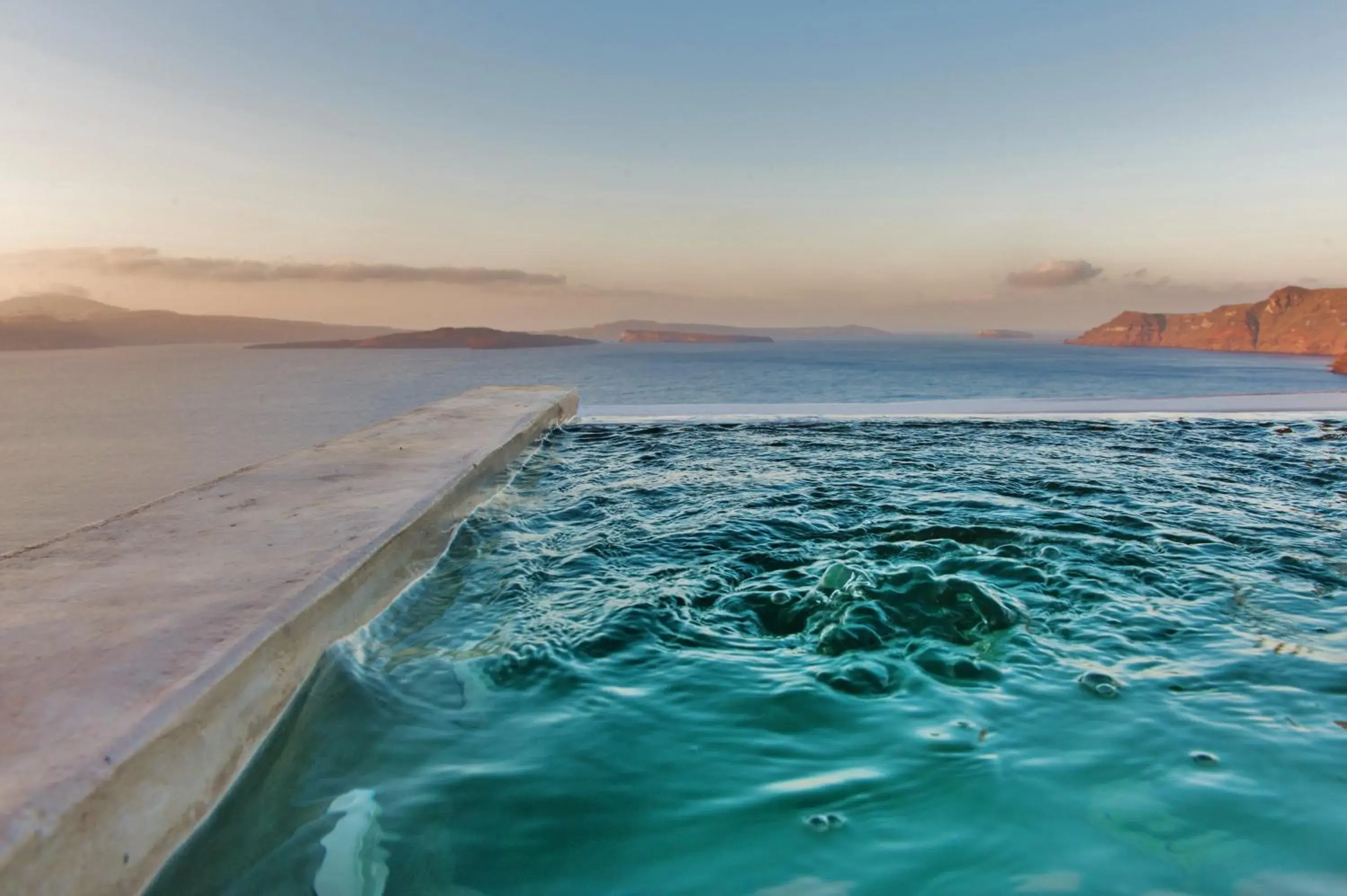 Deluxe Suite with Hot Tub and Caldera View in Chroma Suites Deluxe Suite with Hot Tub and Caldera View in Chroma Suites