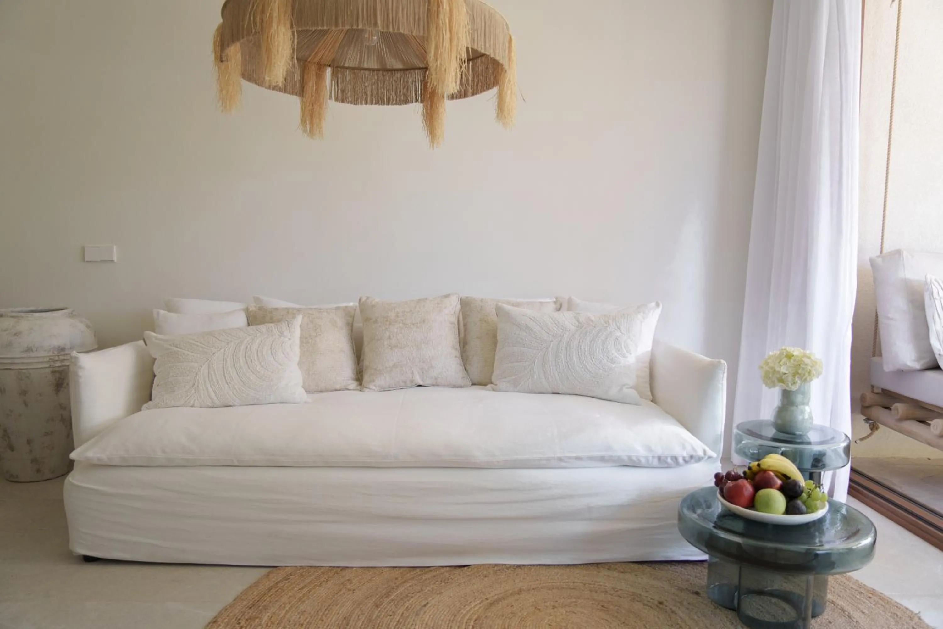 Living room, Bed in Mar Suites Formentera by Universal Beach Hotels