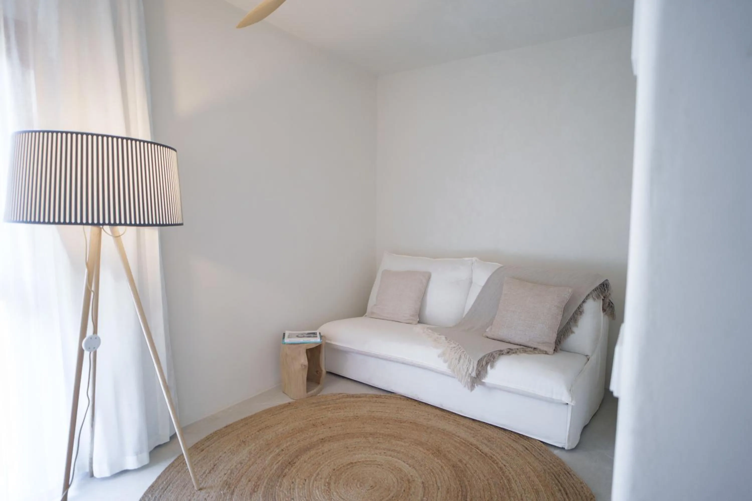 Living room, Bed in Mar Suites Formentera by Universal Beach Hotels