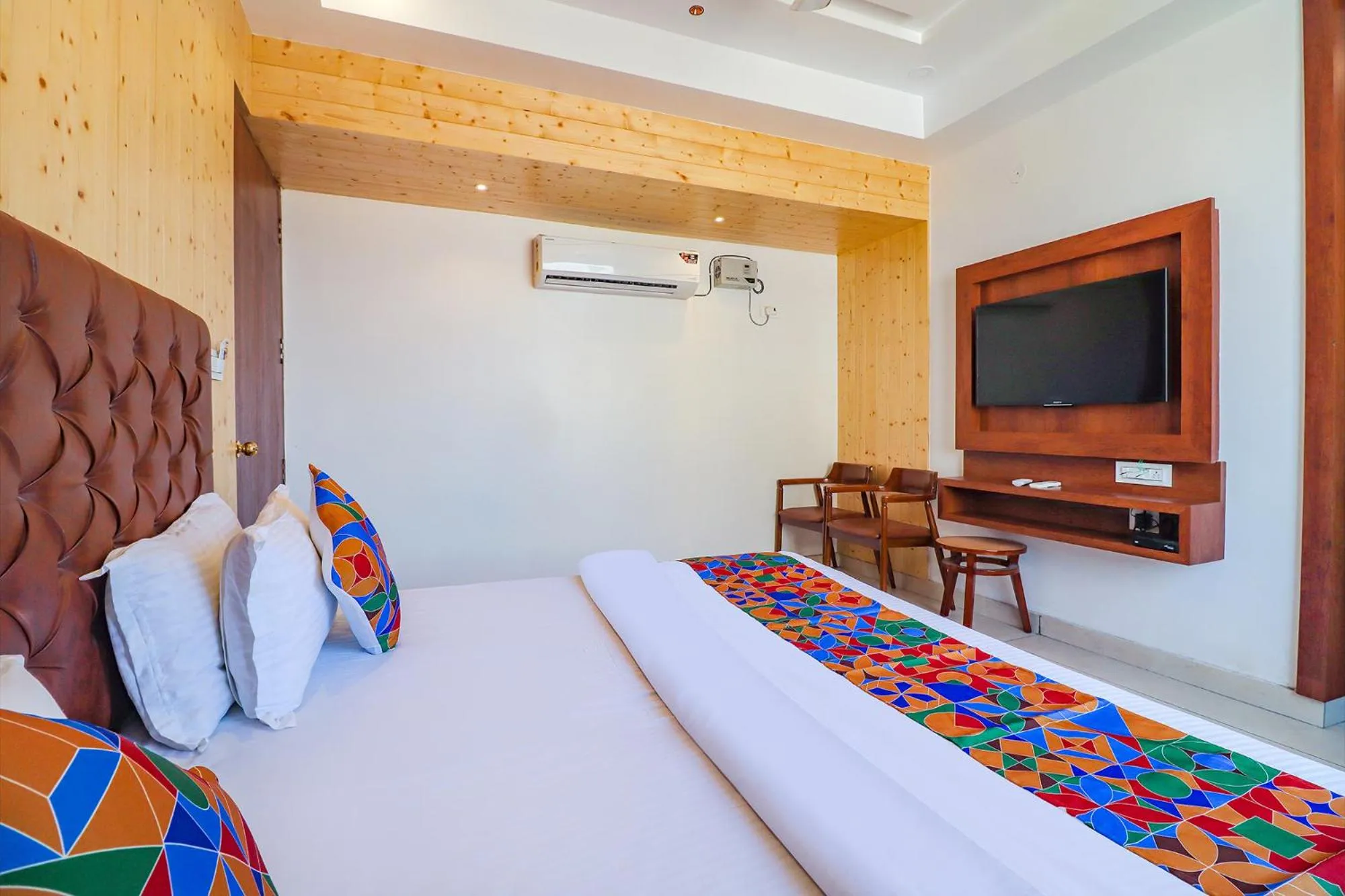 Bed in FabHotel Grand Arya