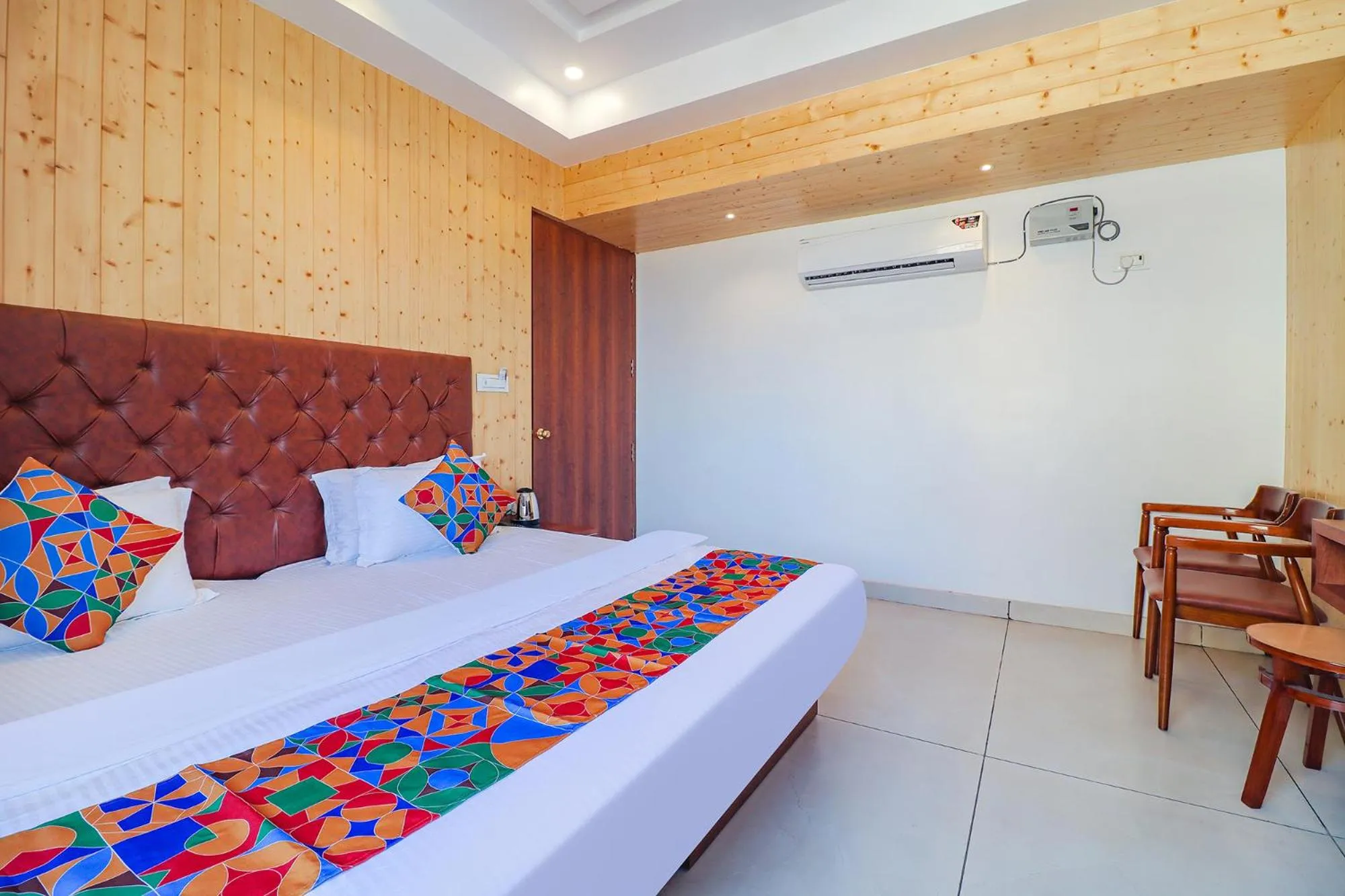Bed in FabHotel Grand Arya