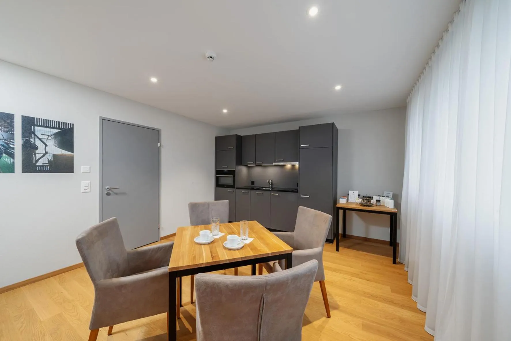 Communal kitchen in Aparthotel Beinwil am See