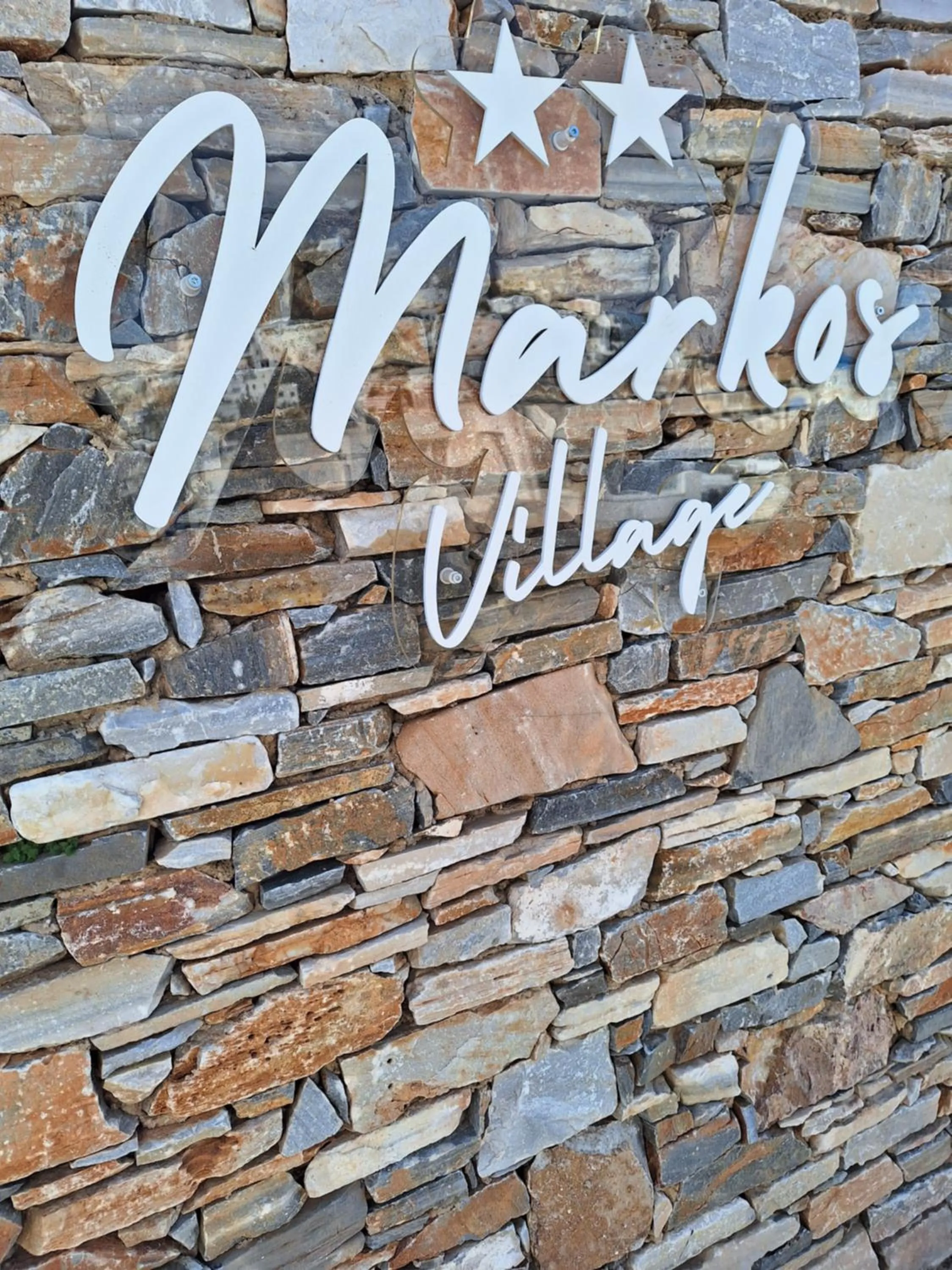 Property logo or sign in Markos Village Pension