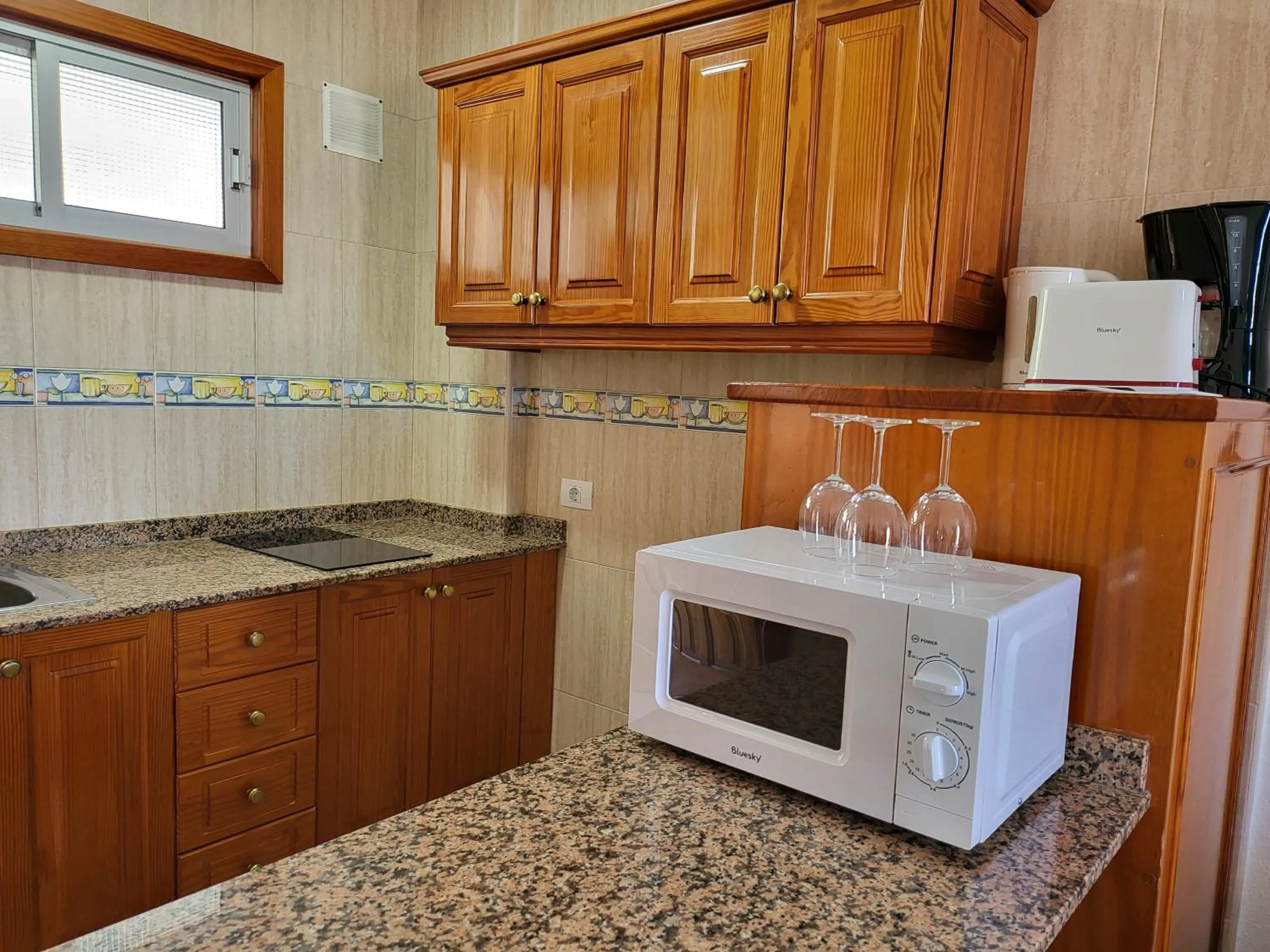 Kitchen or kitchenette in Las Camelias Apartments