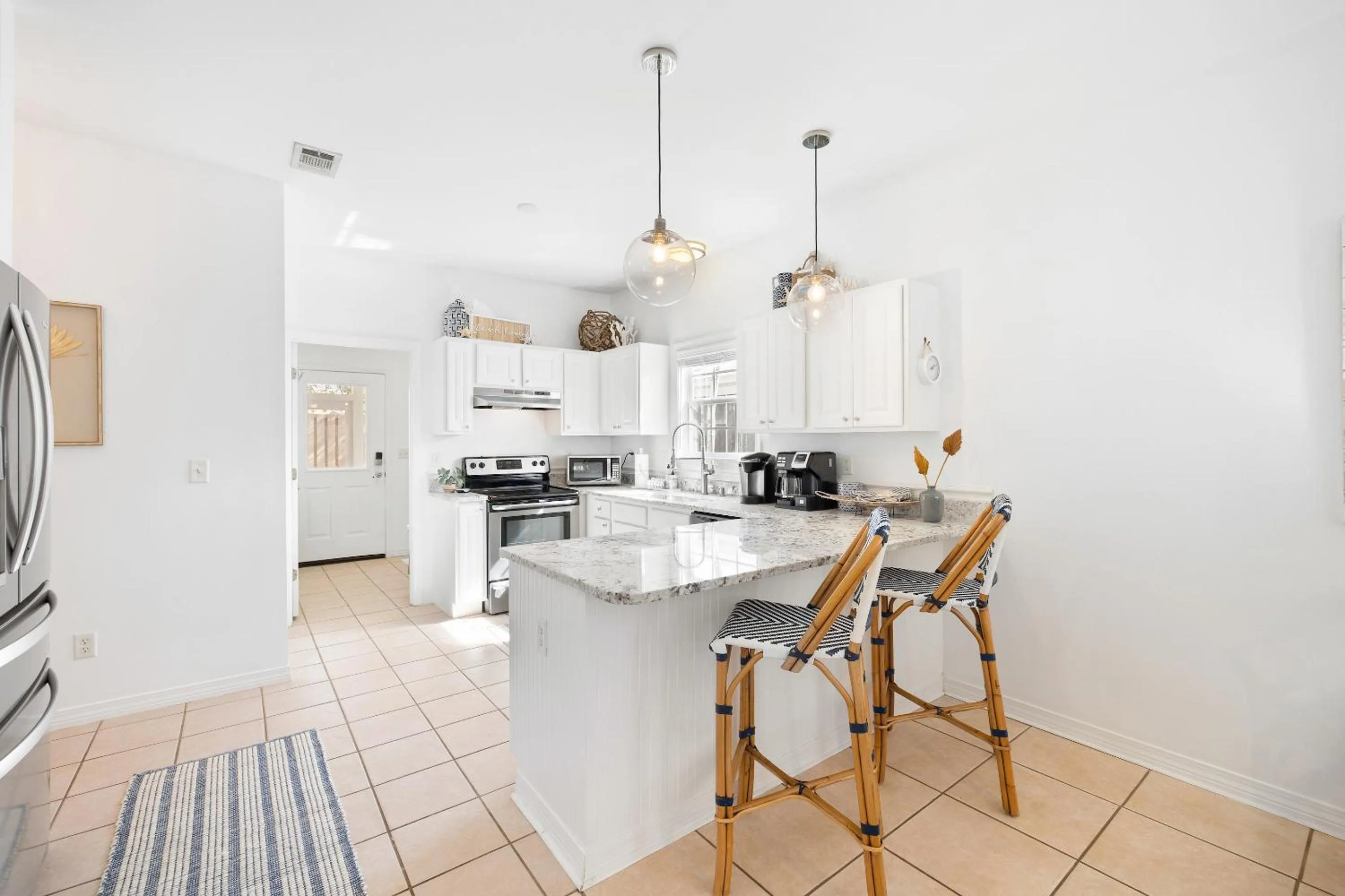 Kitchen or kitchenette in 30A Beach House - Coconut Cottage by Panhandle Getaways