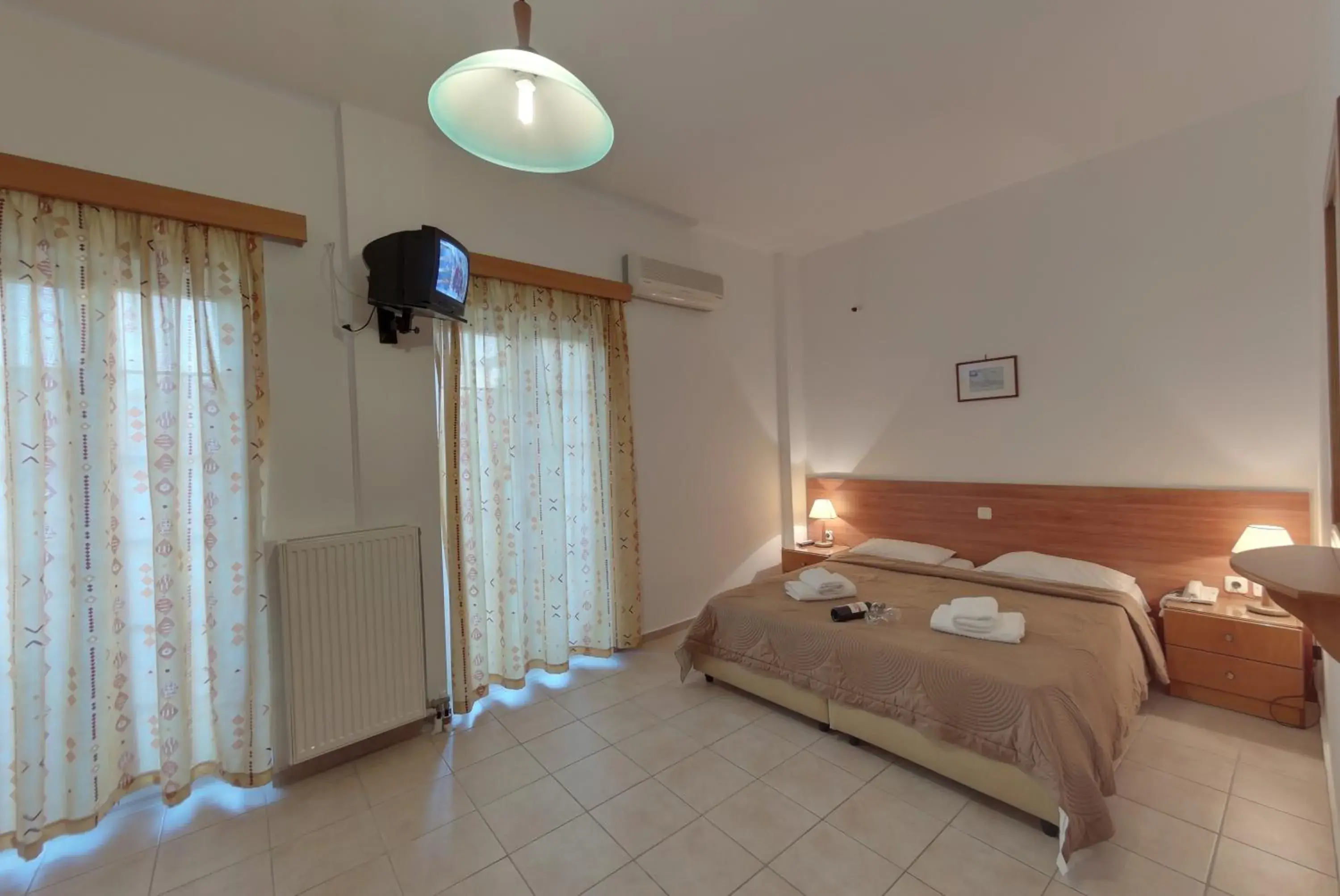 Bed in Marirena Hotel Bed in Marirena Hotel