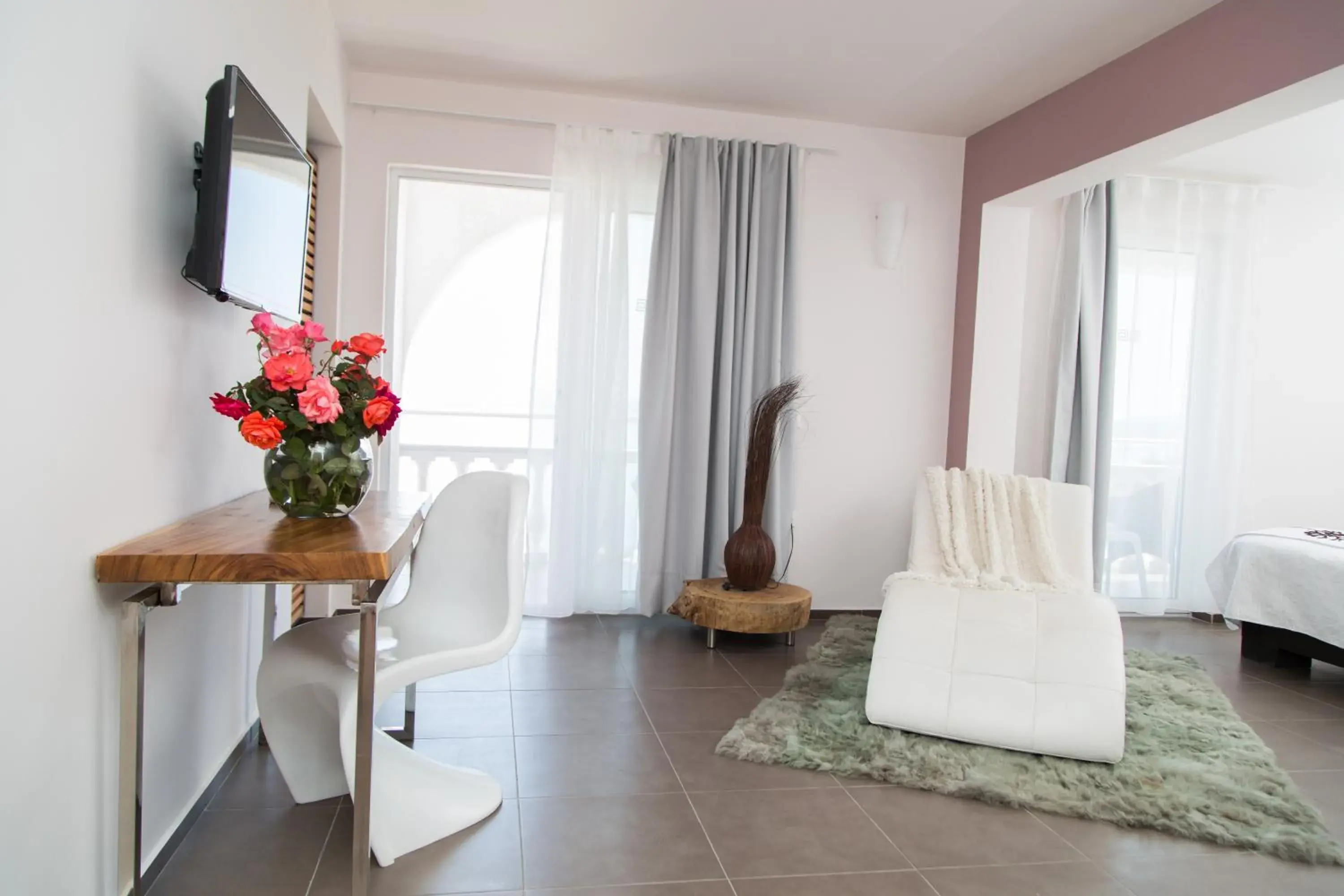 Seating area, Bed in Pantokrator Hotel Seating area, Bed in Pantokrator Hotel