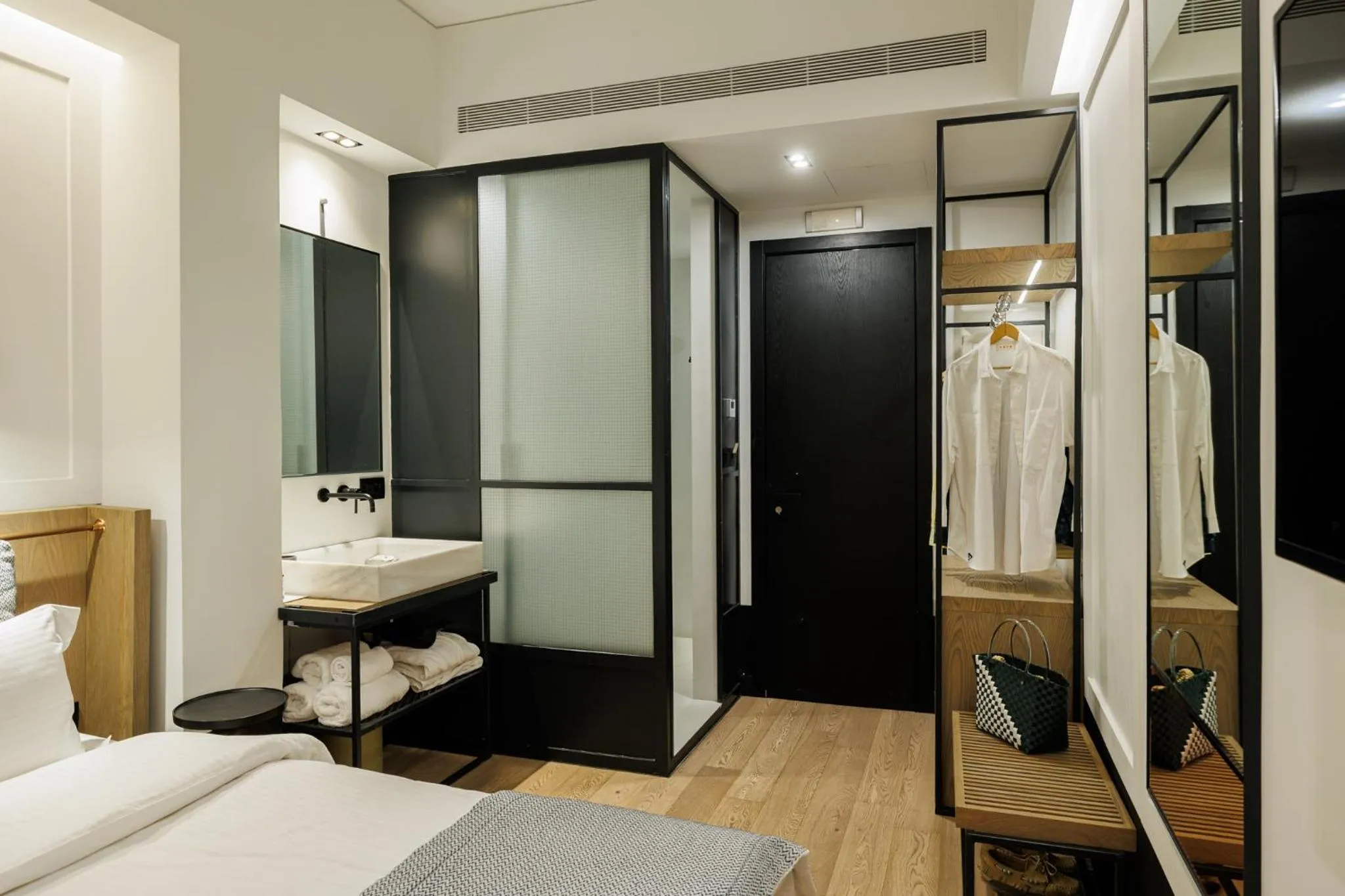 Bed in Niki Athens Hotel