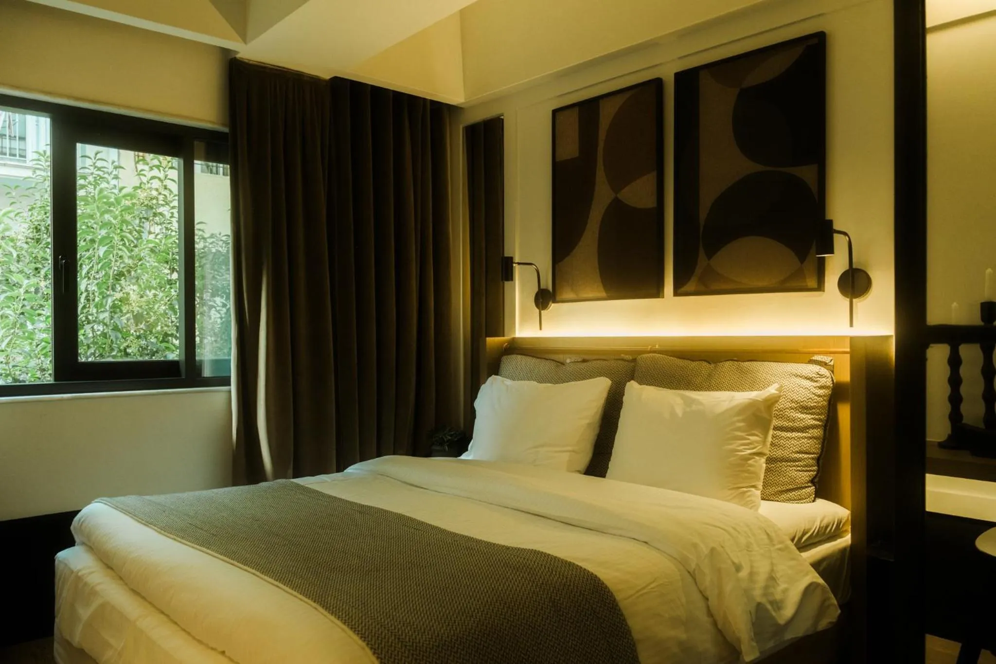 Bed in Niki Athens Hotel