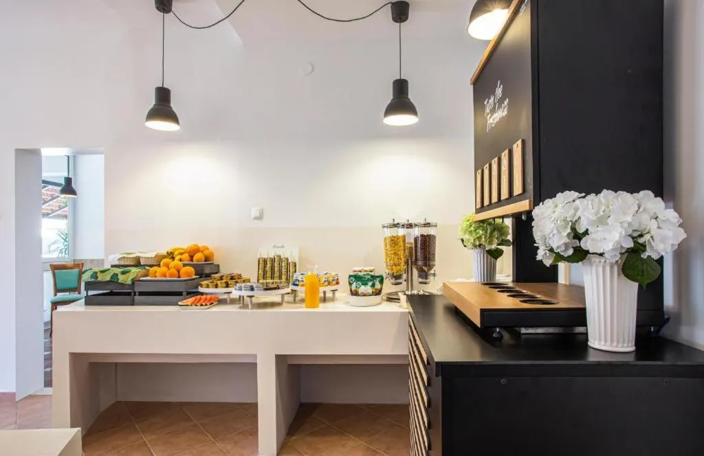 Kitchen or kitchenette in Hotel Lumbarda