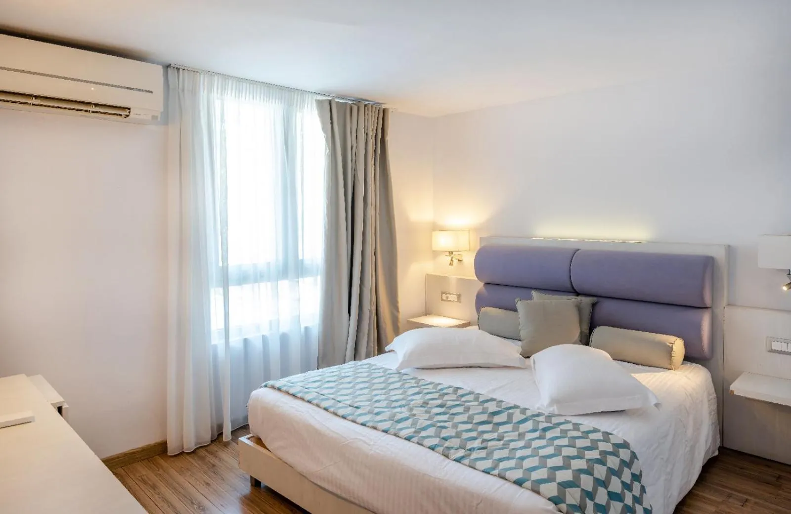 Bed in Triton Boutique Hotel