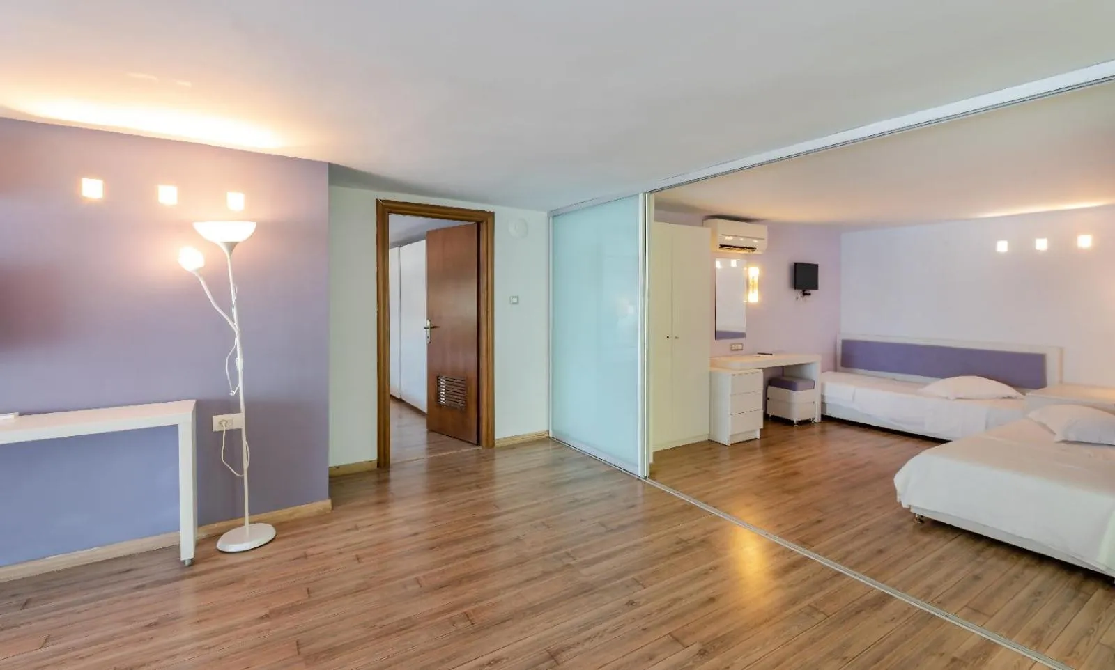 Bed in Triton Boutique Hotel