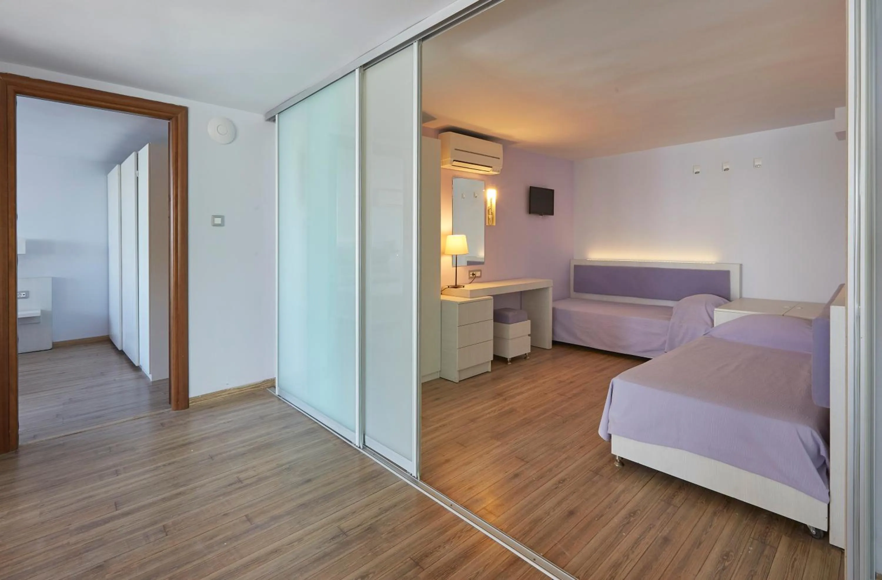 Bed in Triton Boutique Hotel