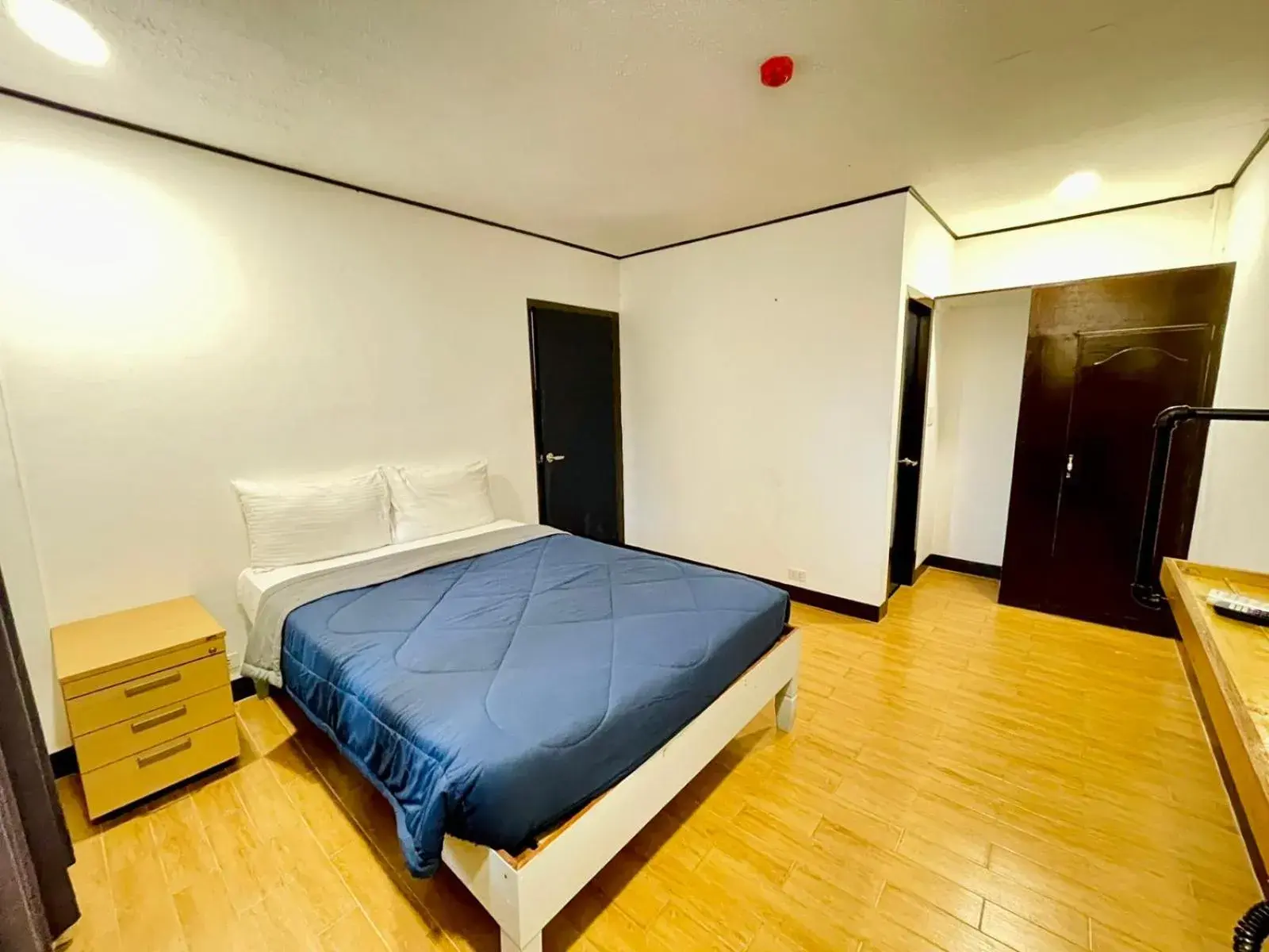 Bed in Bluewing Hotel Angeles powered by Cocotel Bed in Bluewing Hotel Angeles powered by Cocotel