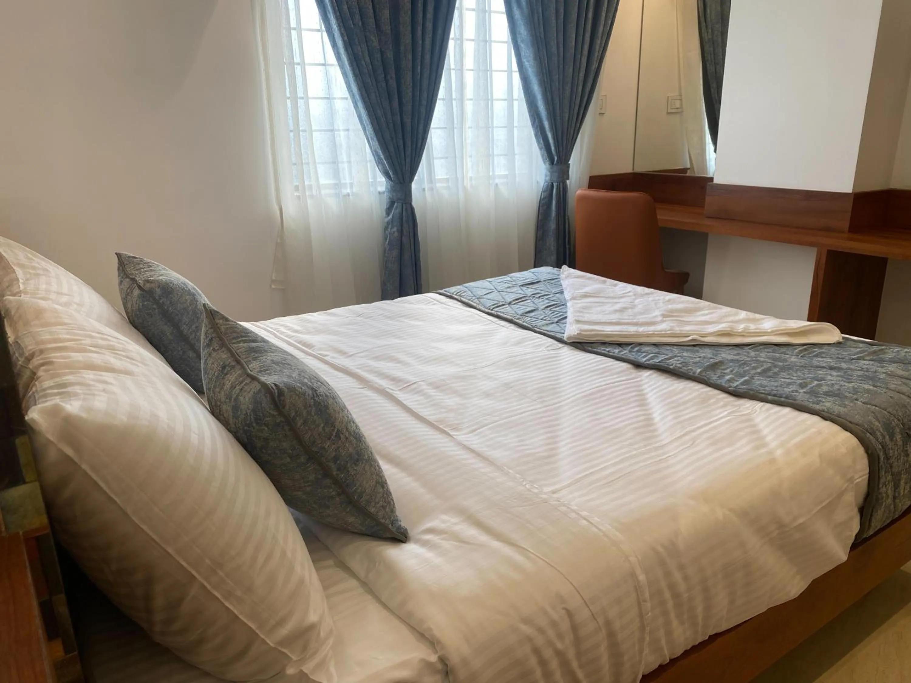 Bed in The Urban Hive Hotel