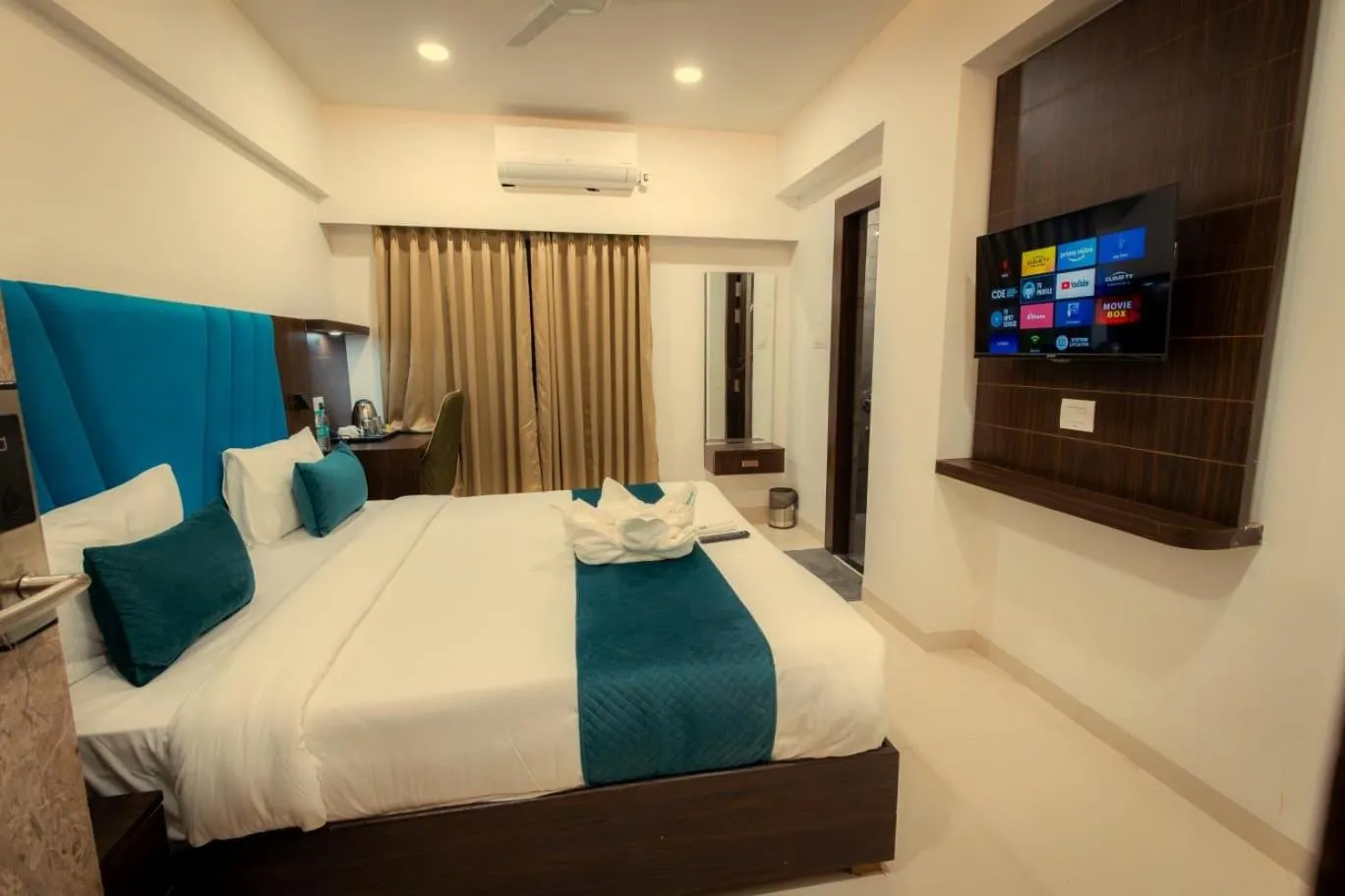 Photo of the whole room, Bed in Hotel Meritel Grande, Vijay Nagar, Indore