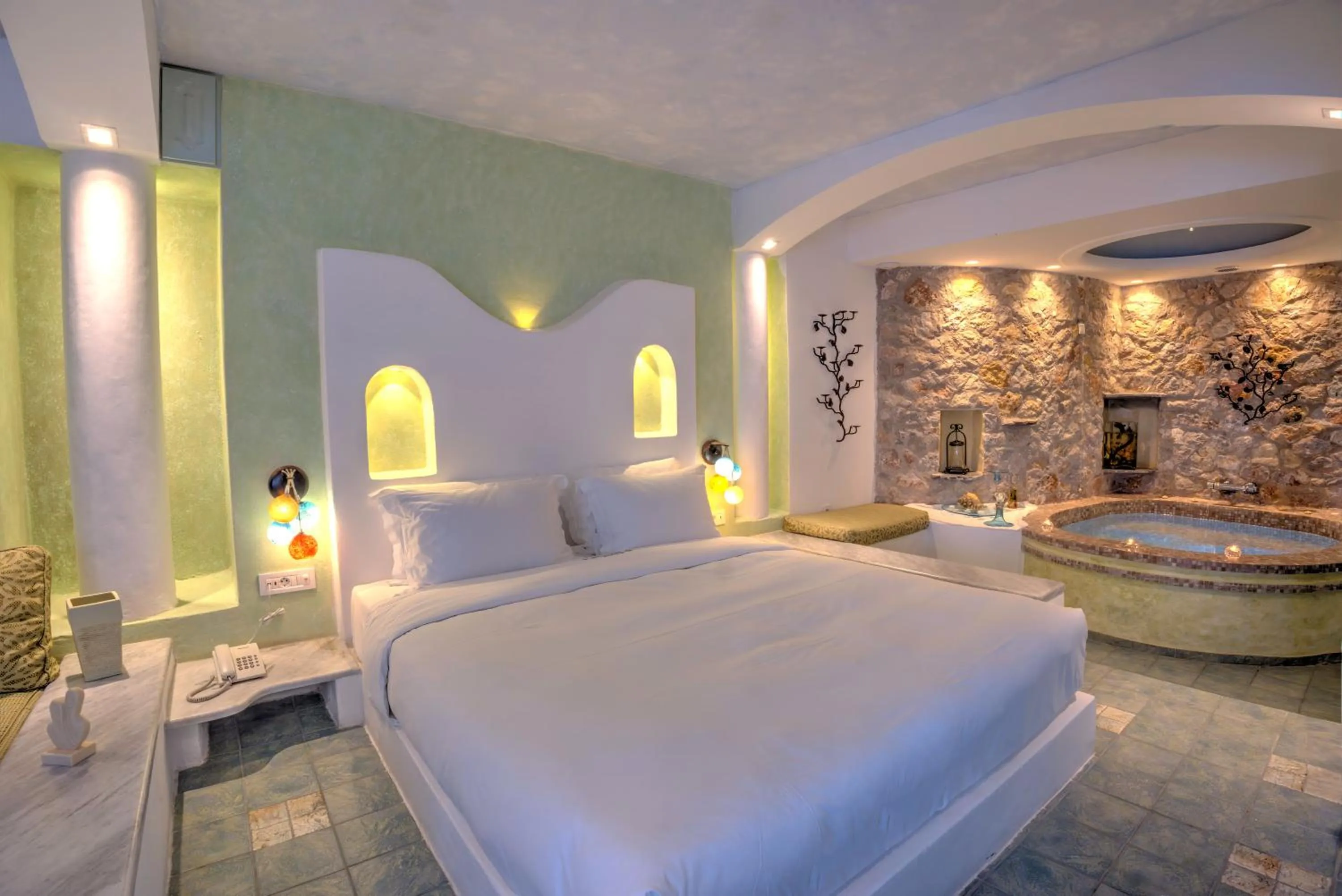 Bed in Astarte Suites