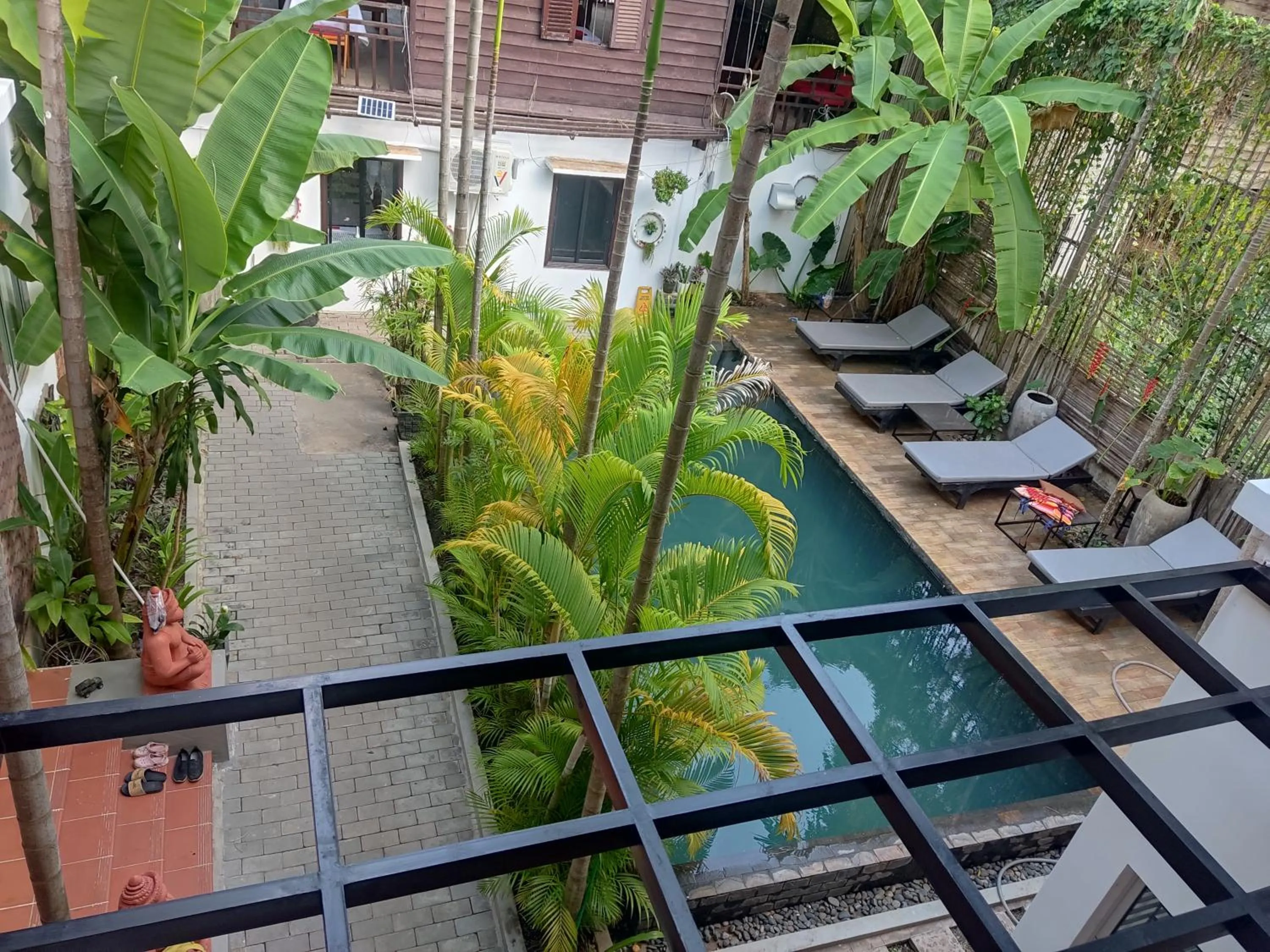 Swimming pool in River and villa