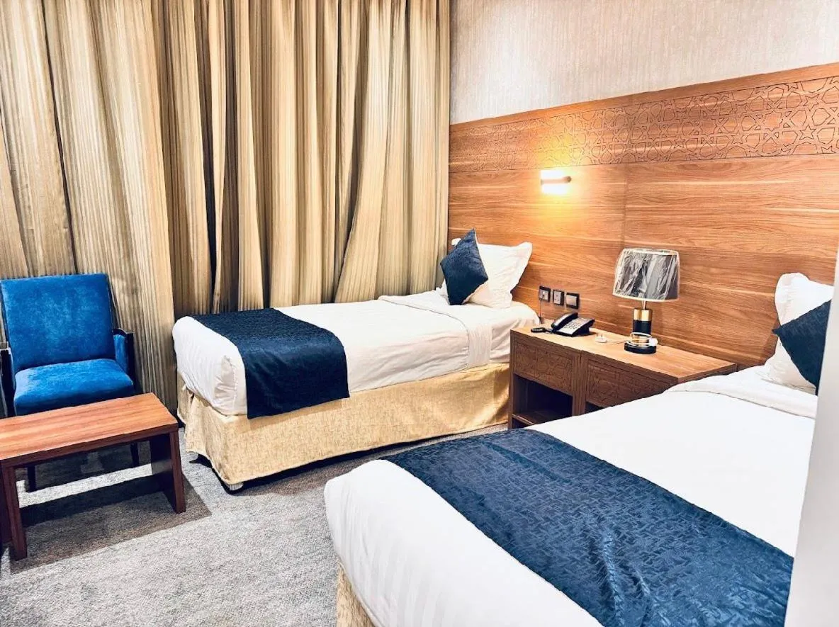 Bed in Rowaa Al Azizia Hotel