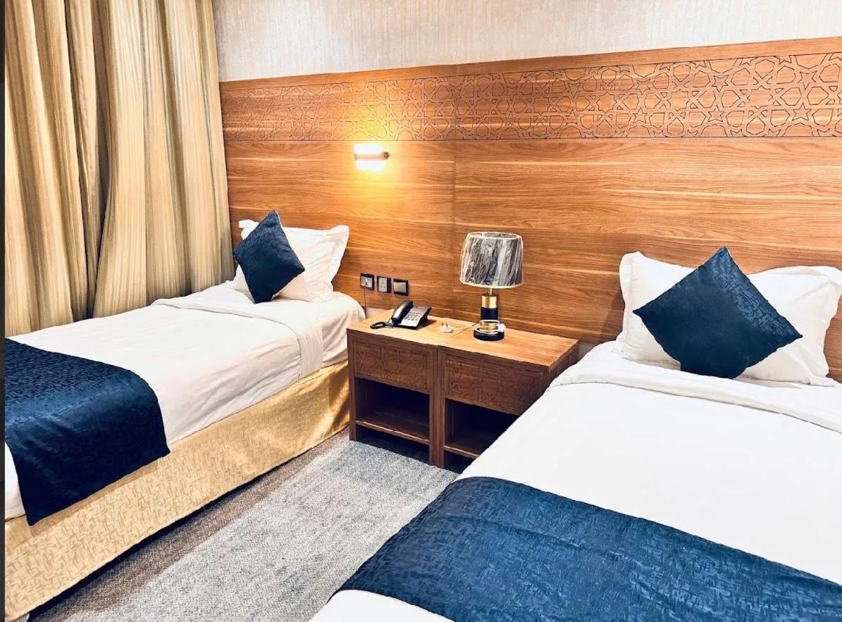 Bed in Rowaa Al Azizia Hotel