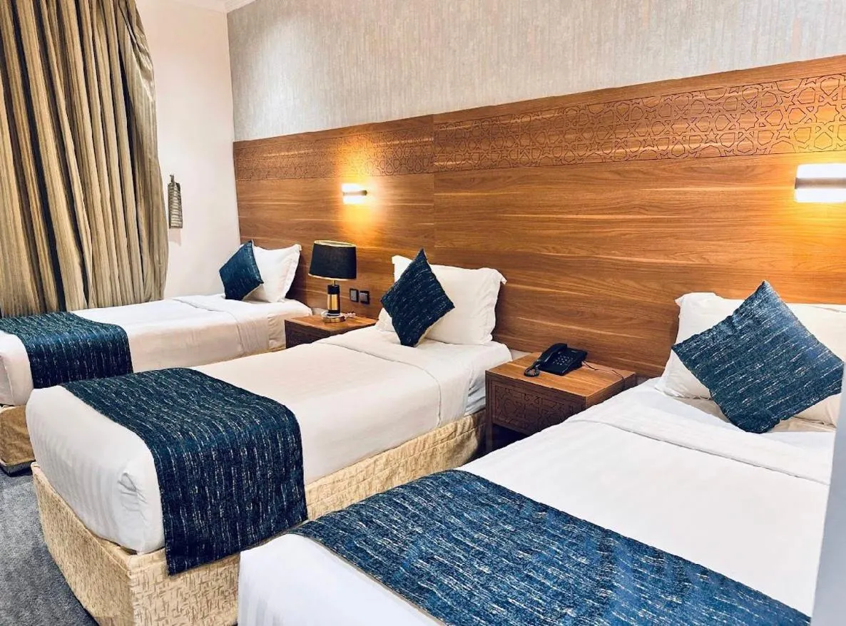 Bed in Rowaa Al Azizia Hotel