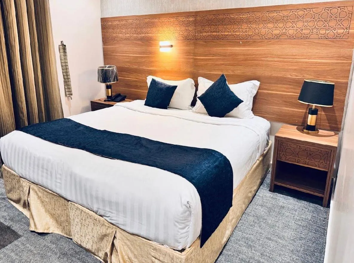 Bed in Rowaa Al Azizia Hotel