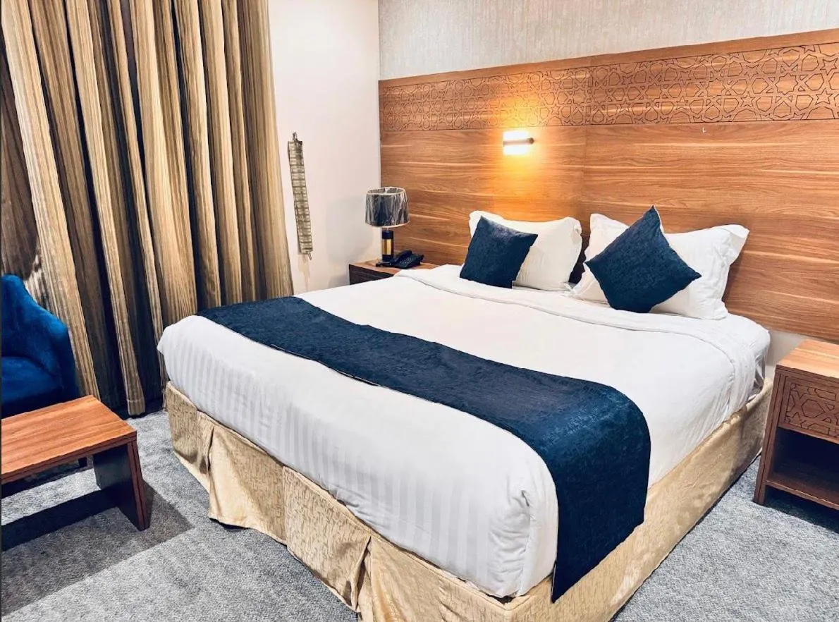 Bed in Rowaa Al Azizia Hotel