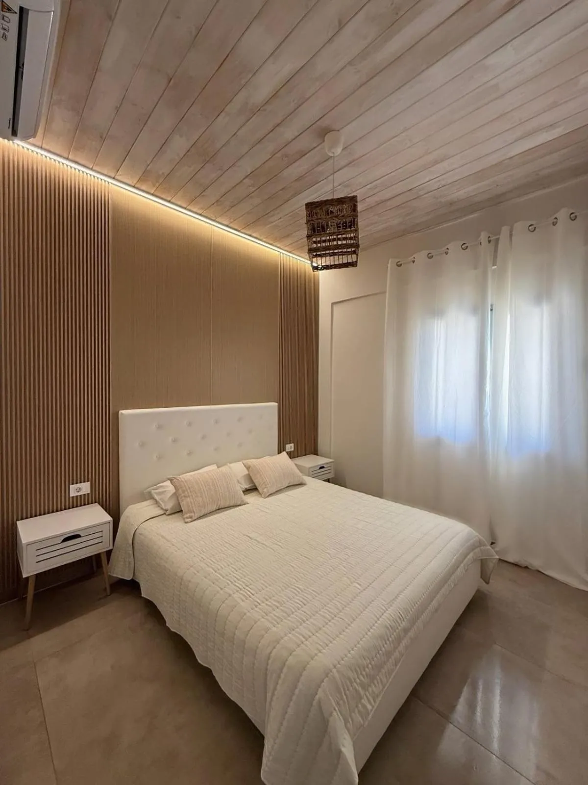 Bed in Nikolas Apartments