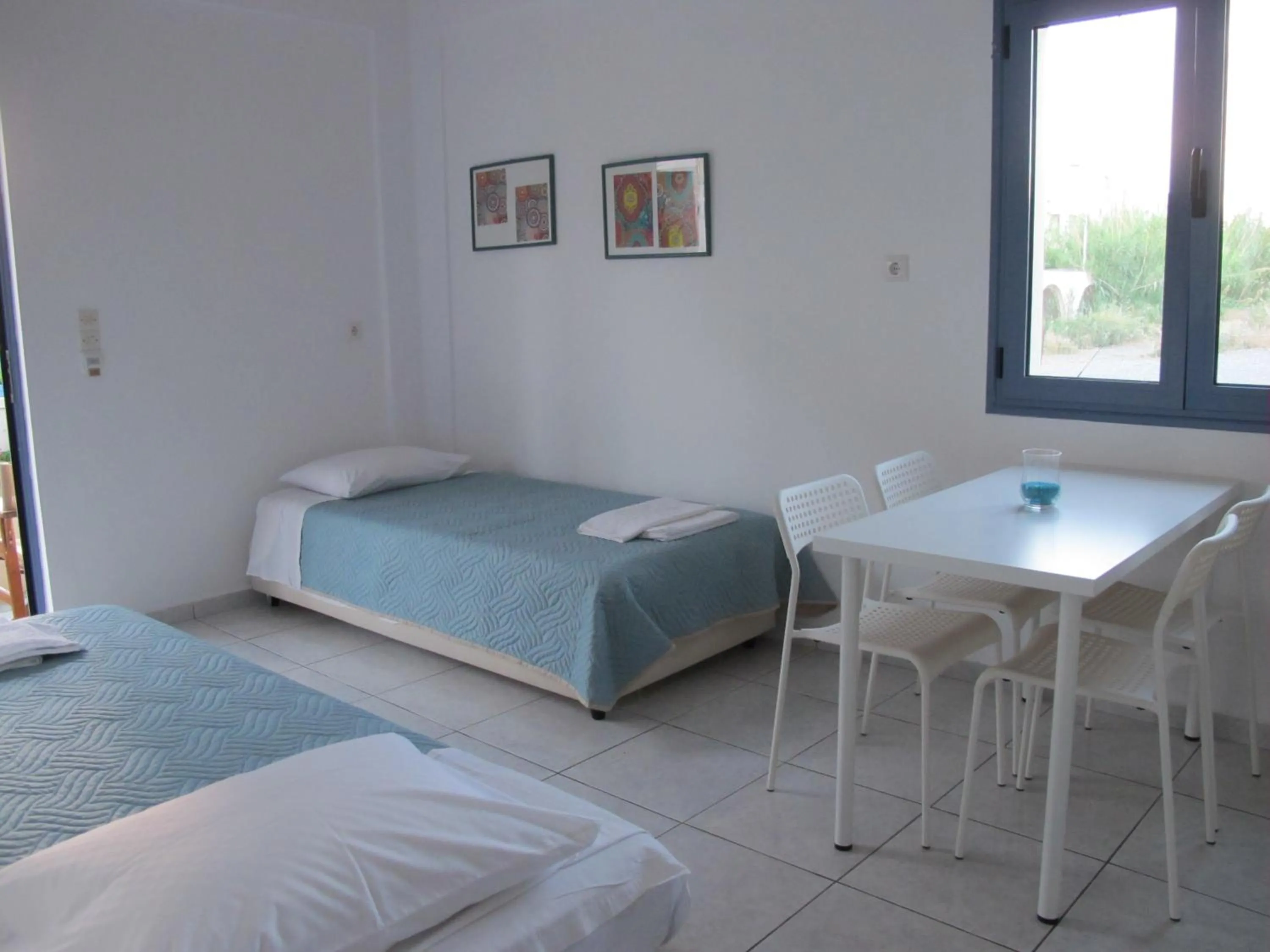 Bed in Nikolas Apartments