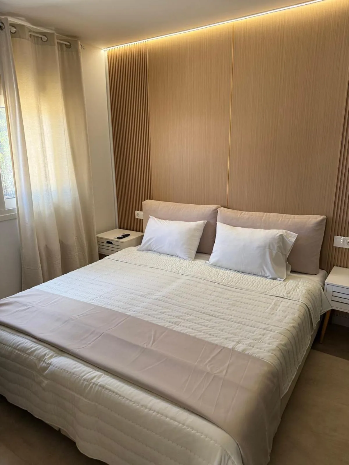 Bed in Nikolas Apartments