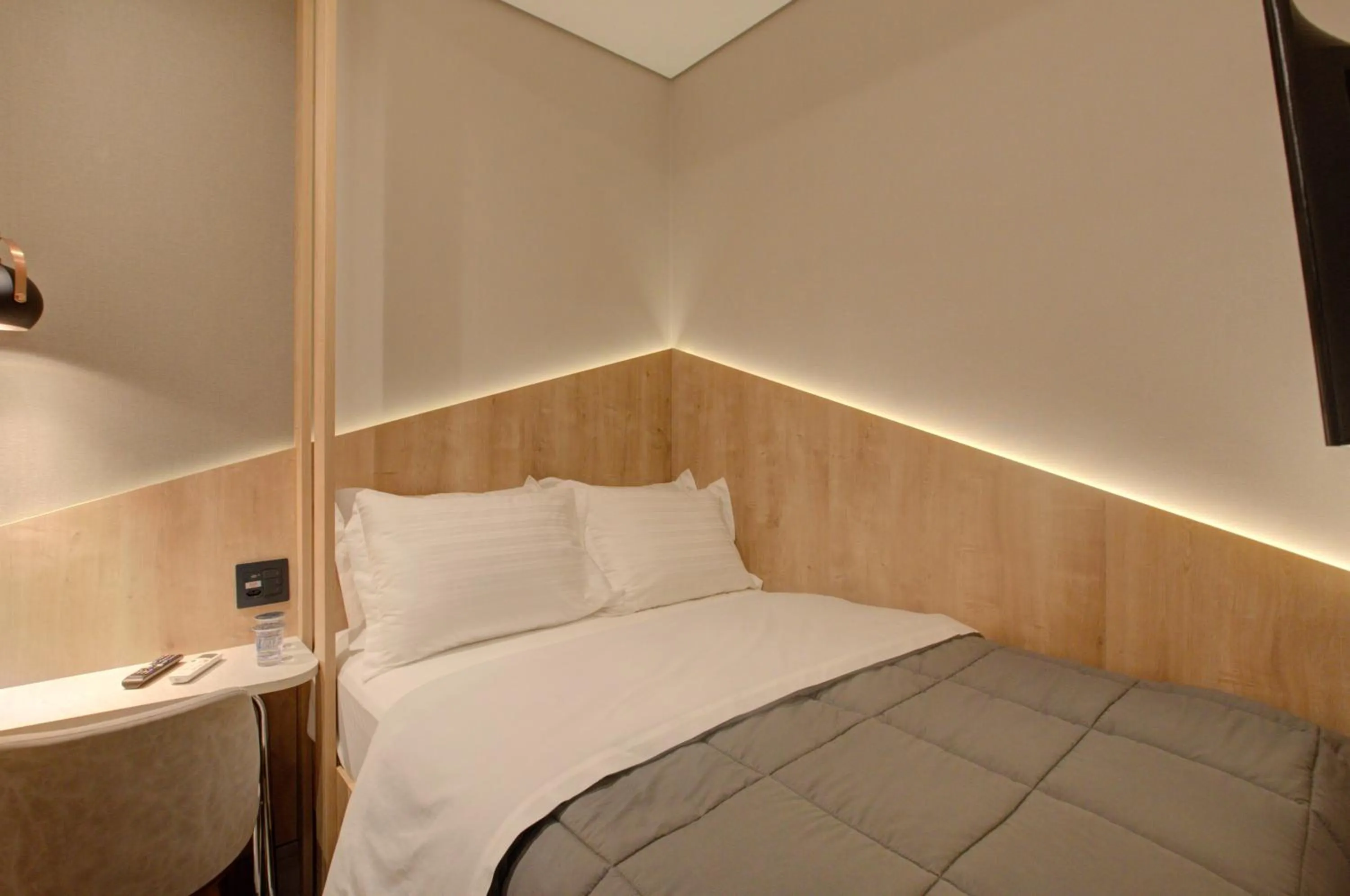 Bed in Fast Sleep Suites by Slaviero Hoteis - Hotel dentro do Aeroporto de Guarulhos - Terminal 2 - desembarque oeste