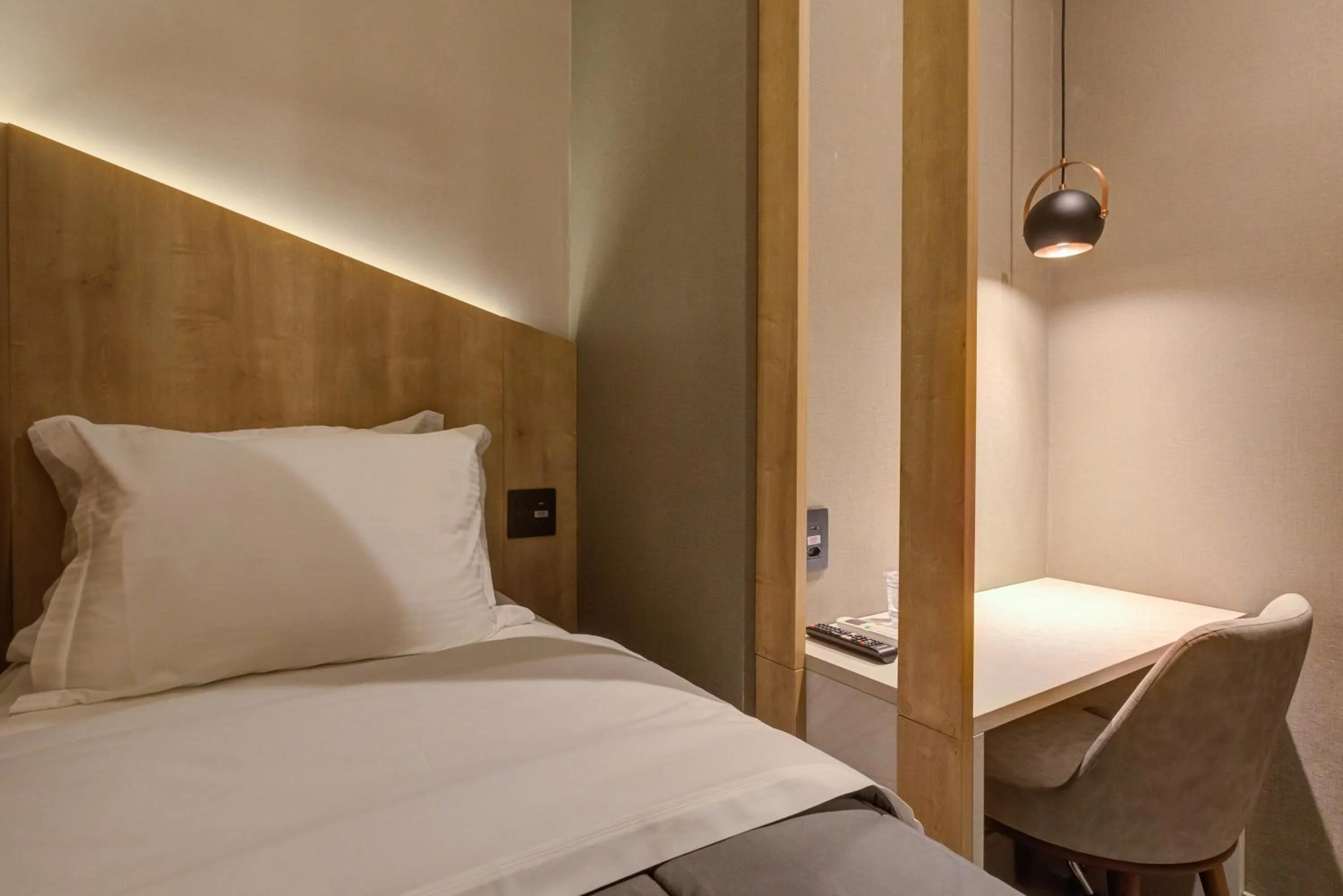 Bed in Fast Sleep Suites by Slaviero Hoteis - Hotel dentro do Aeroporto de Guarulhos - Terminal 2 - desembarque oeste