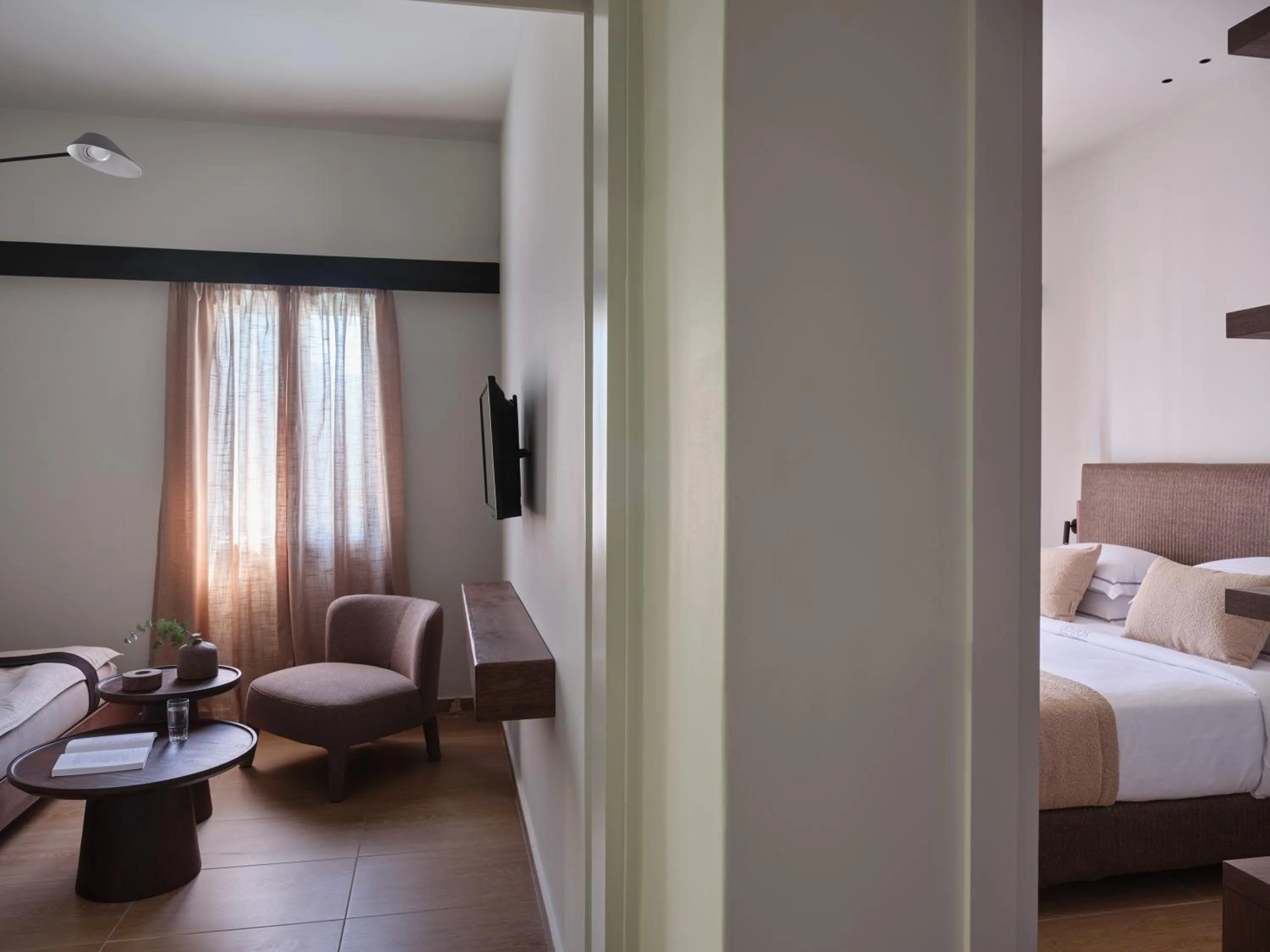 Bed in Loizos Stylish Residences