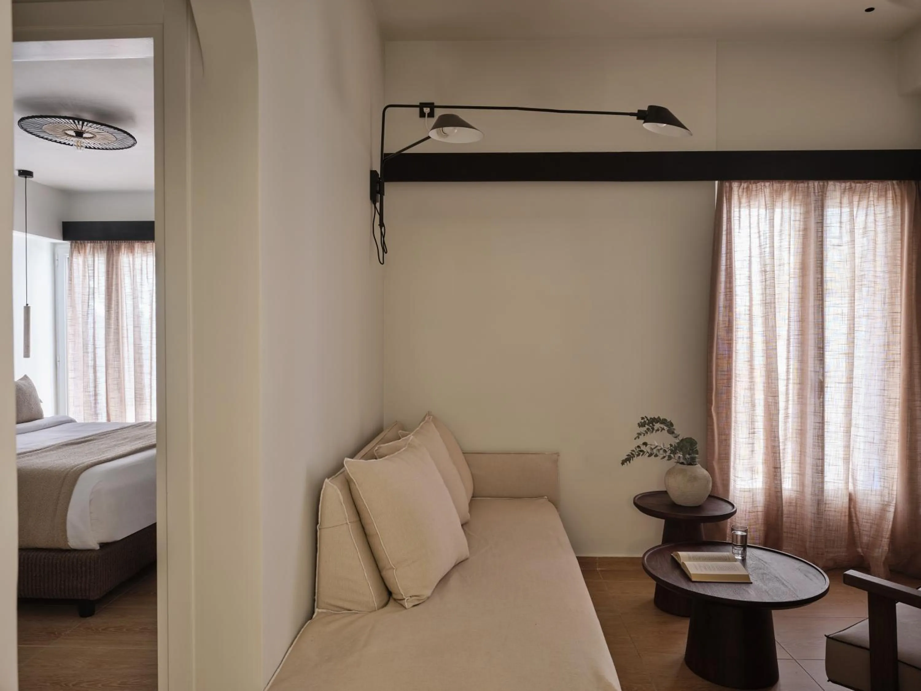 Bed in Loizos Stylish Residences