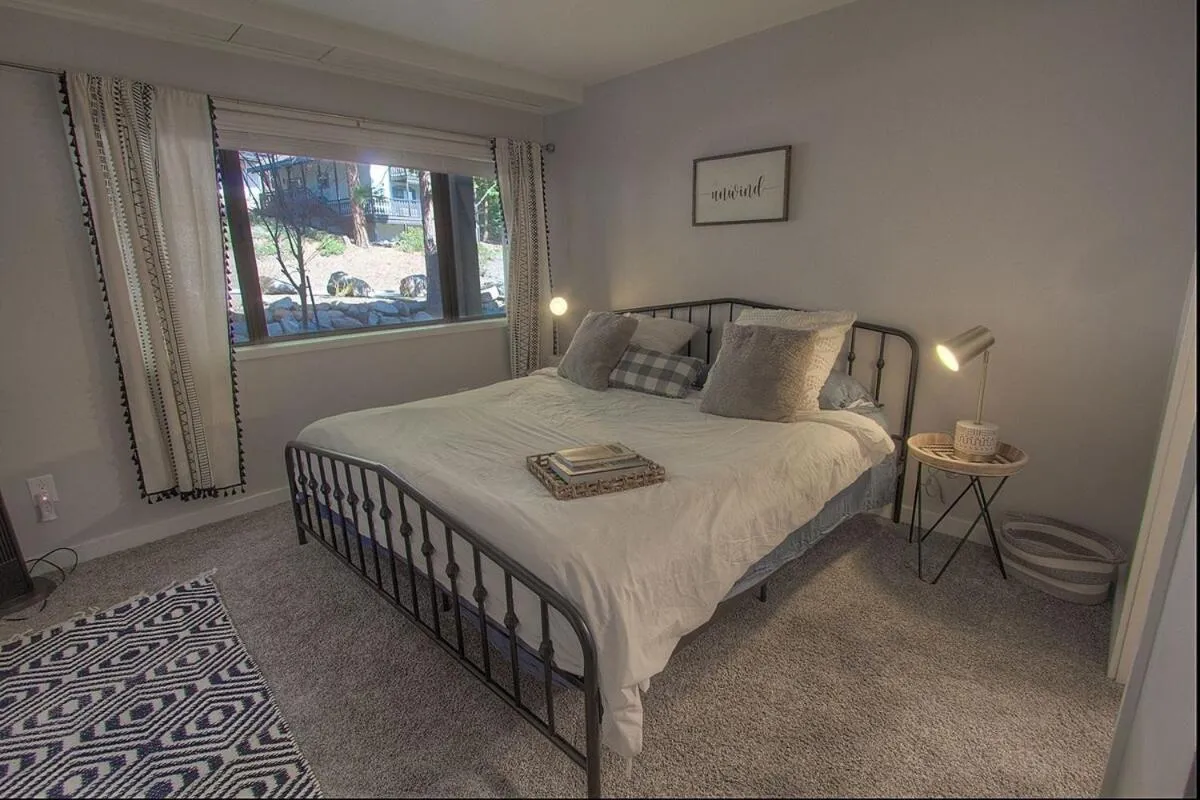 Bed in Taste of Burgundy condo