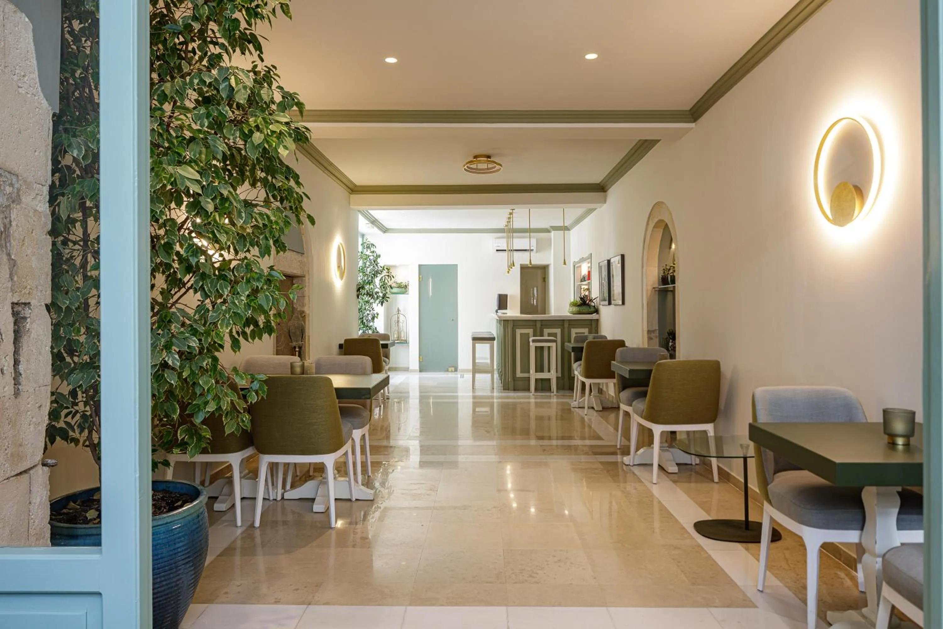 Lobby or reception in Mythos Suites Boutique Hotel