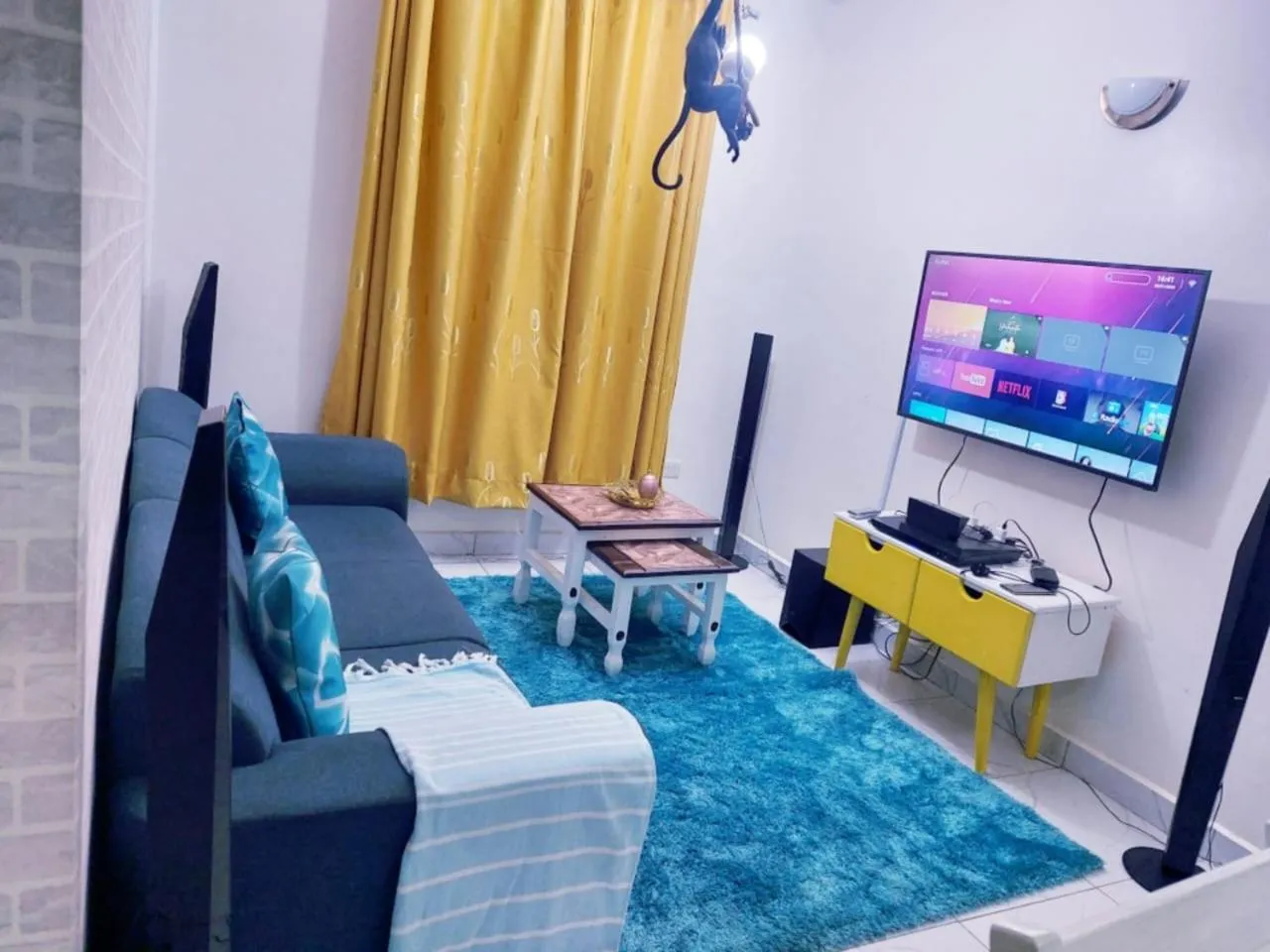 TV and multimedia in Lux Suites Milimani Furnished Apartments