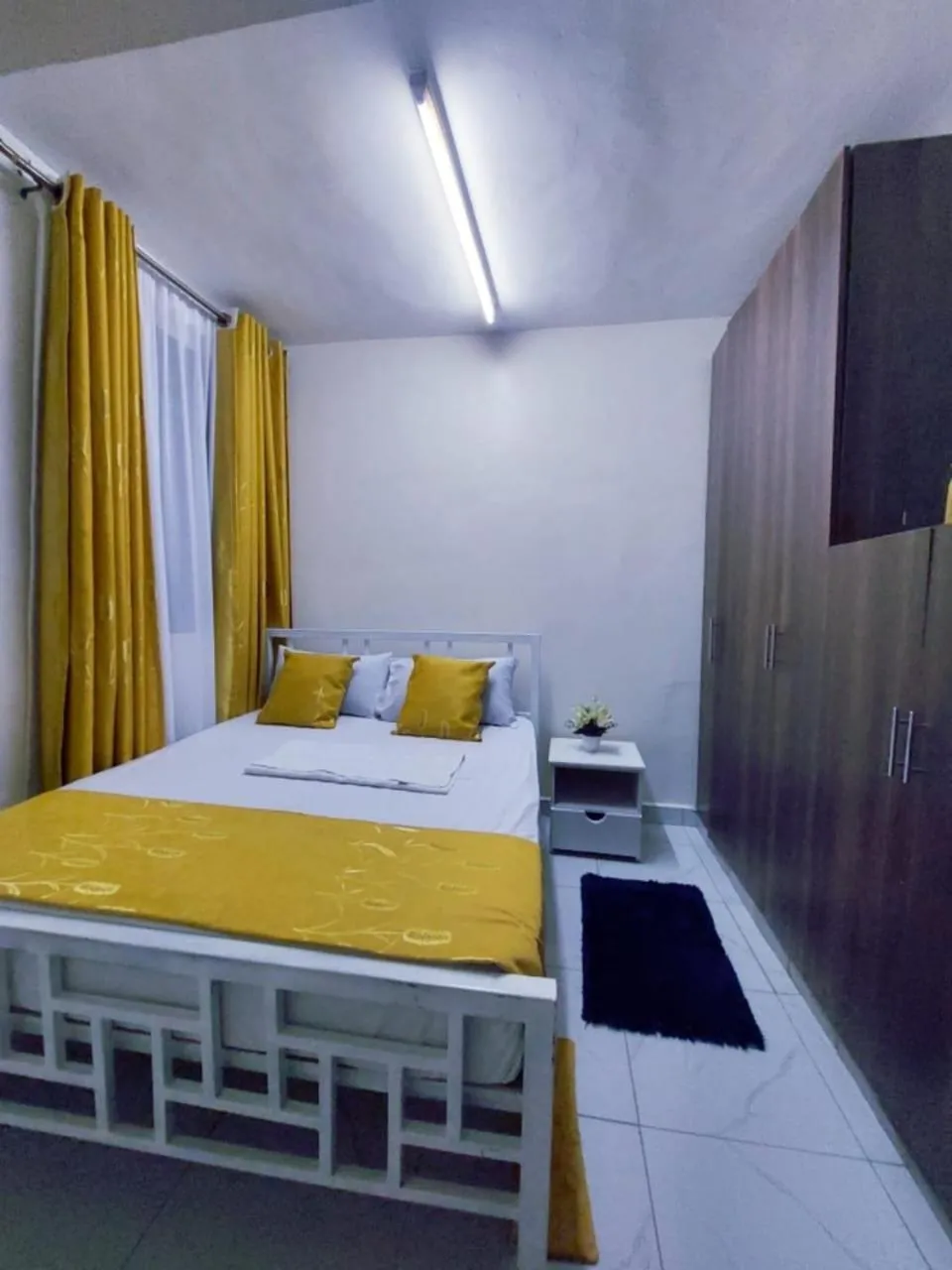 Bed in Lux Suites Milimani Furnished Apartments